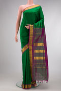 Bottle Green Dual Tone Kanchipuram Silk Nine Yards Saree with Plain Body and Zari Border.  displayed on a mannequin