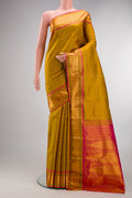 Pure Silk Mehandi Green Kanchipuram Saree with Stripes on the body and Zari Border.  displayed on a mannequin