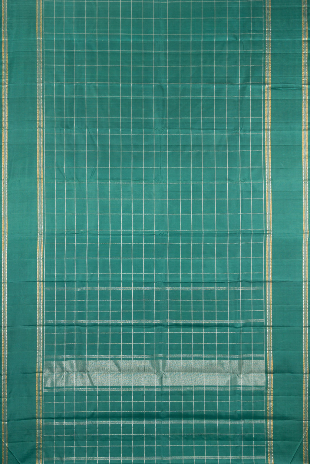 Flat view of Pure Silk Teal Kanchipuram Saree with Checked design on the body and Zari Border. 