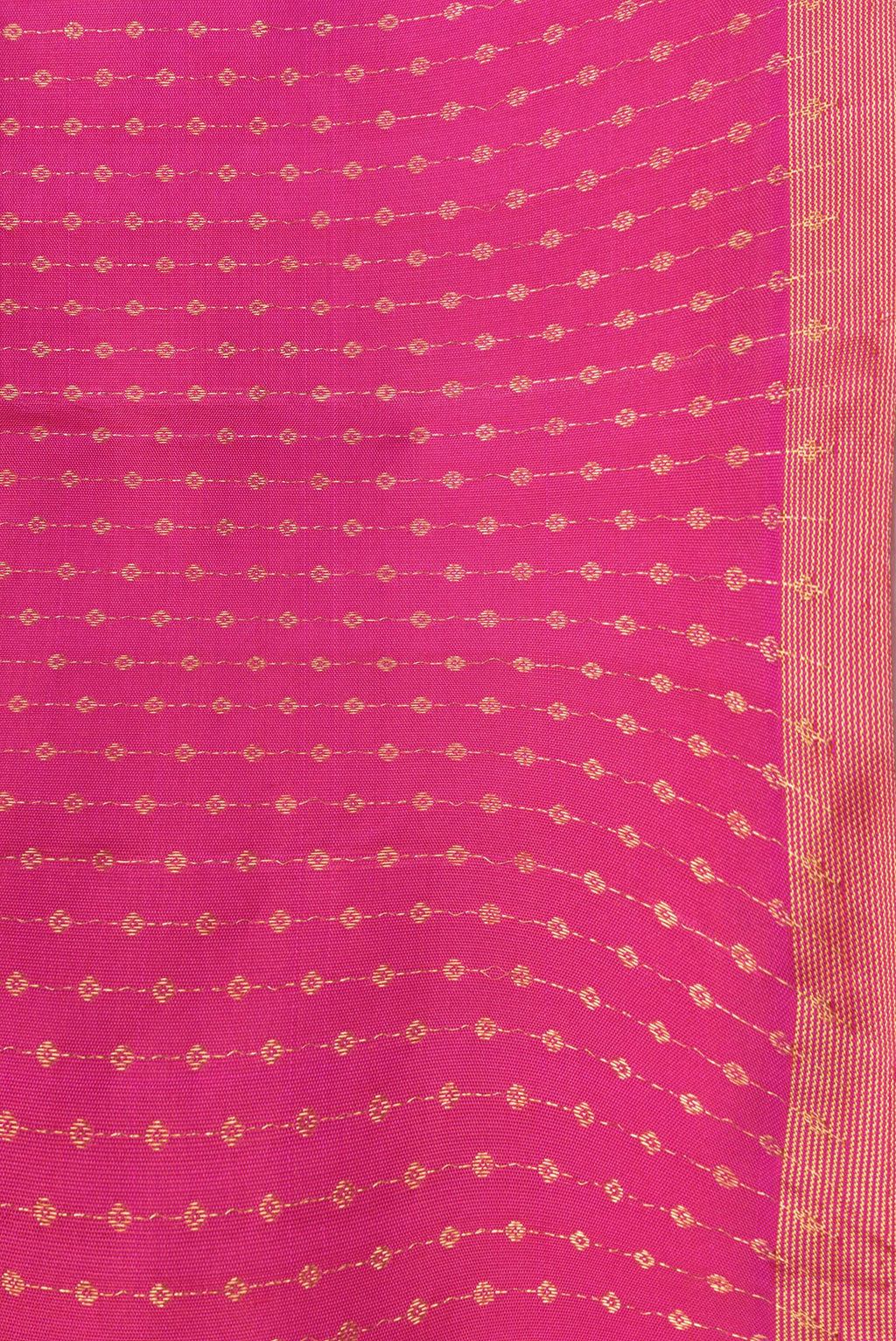 Border image of Dark Pink Dual Tone Kanchipuram Silk Saree with Zari Butta on the body and Thin Zari Line. 
