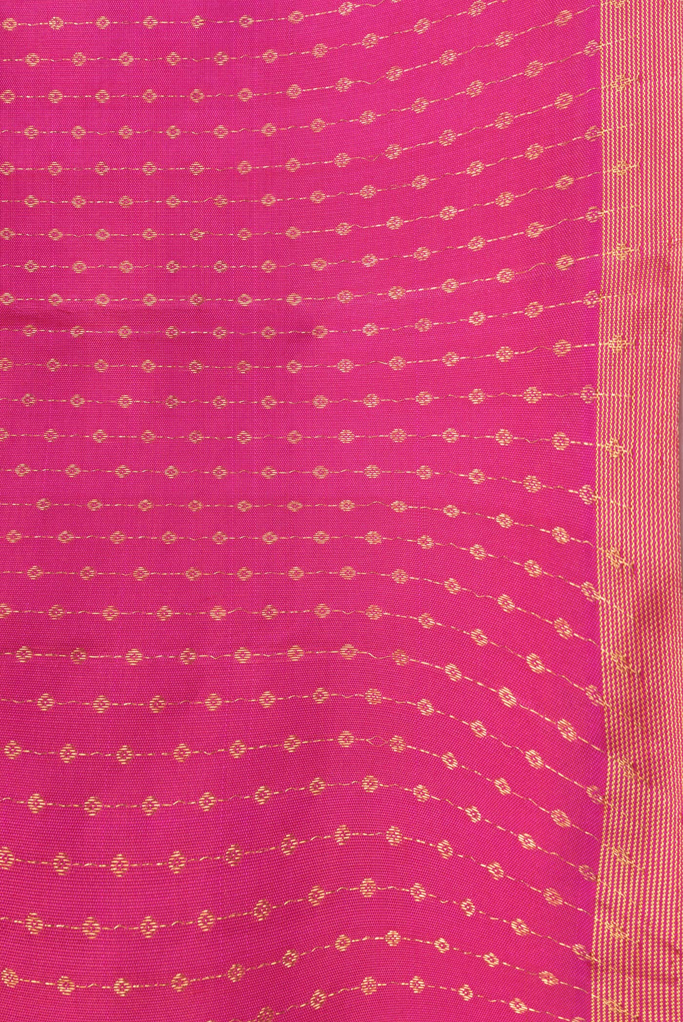 Border image of Dark Pink Dual Tone Kanchipuram Silk Saree with Zari Butta on the body and Thin Zari Line. 