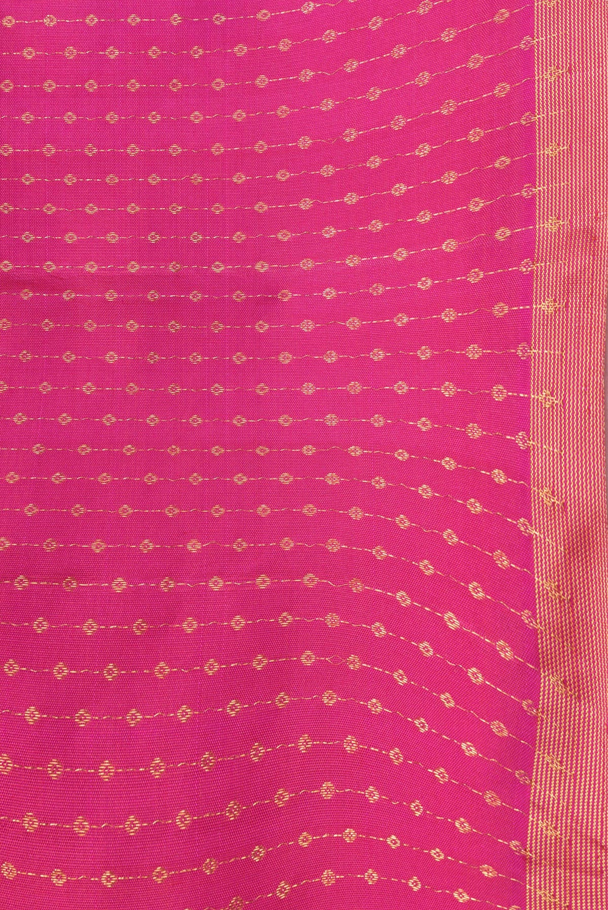 Border image of Dark Pink Dual Tone Kanchipuram Silk Saree with Zari Butta on the body and Thin Zari Line. 