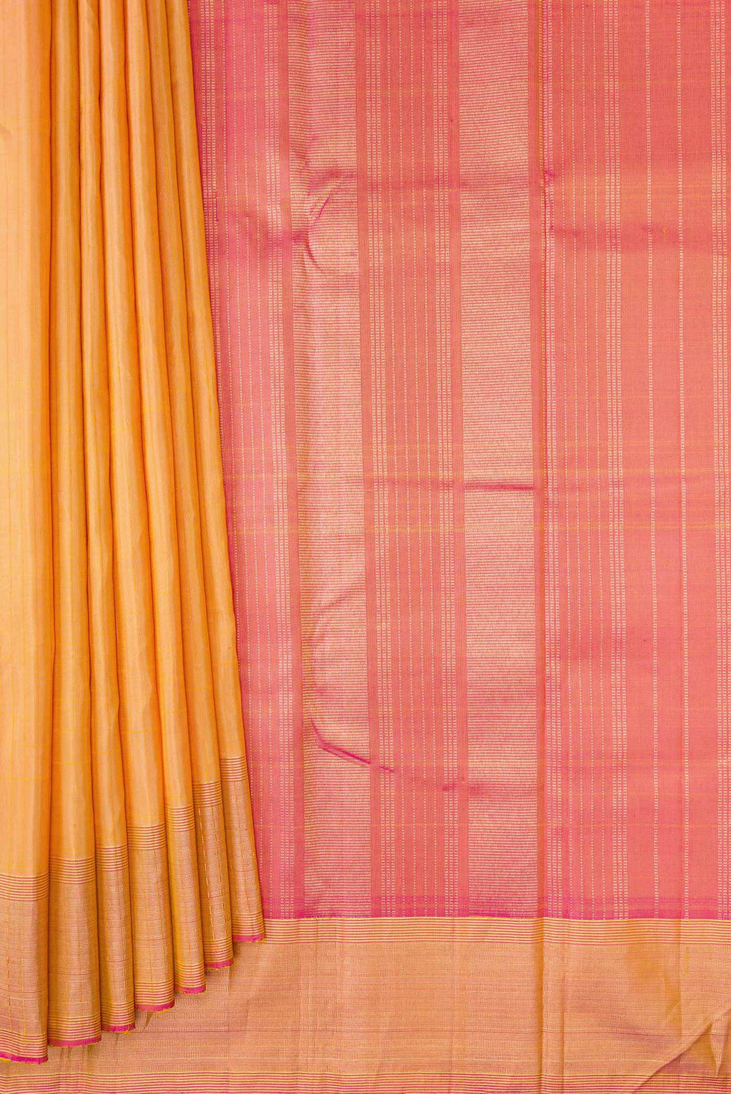 Pleats and pallu of Golden Peach Dual Tone Kanchipuram Silk Saree with Stripes on the body and Zari Border. 