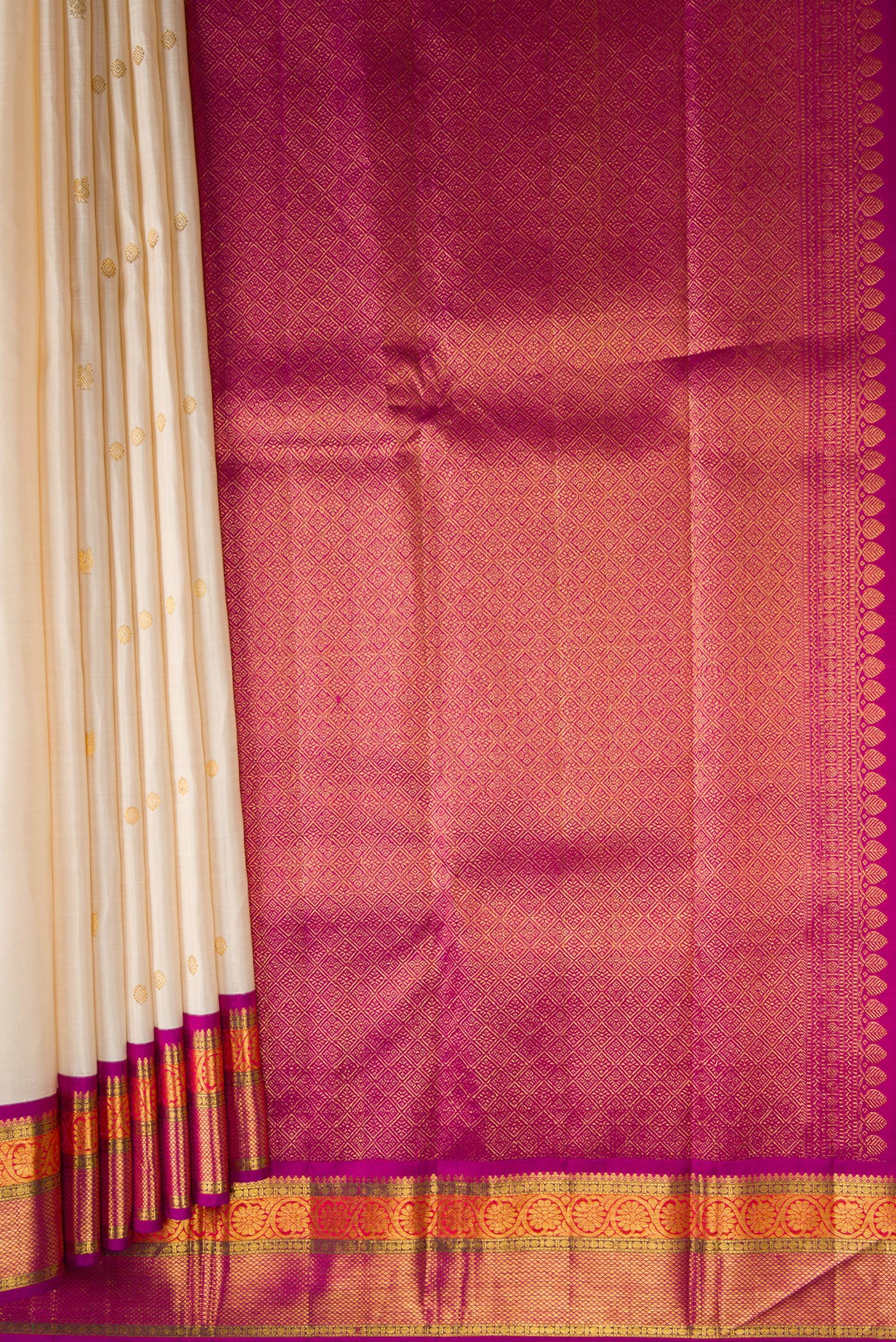 Pleats and pallu of Pure Silk Pure Zari Beige Dual Tone Kanjivaram Saree with Zari Butta on the body and Zari Border. 