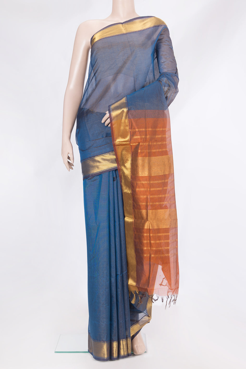 Peacock Blue Silk Cotton Saree with Stripes on the body and Zari Border.  displayed on a mannequin