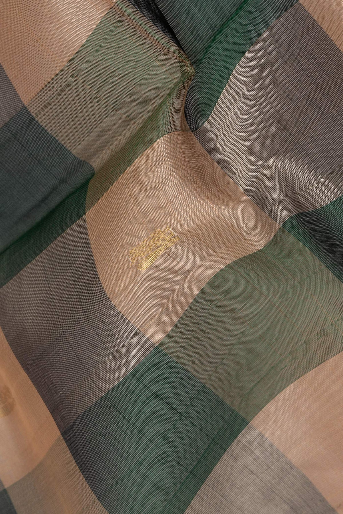 Close up of Multi Color Silk Cotton Saree with Checked design on the body and Zari Border.  displaying folds