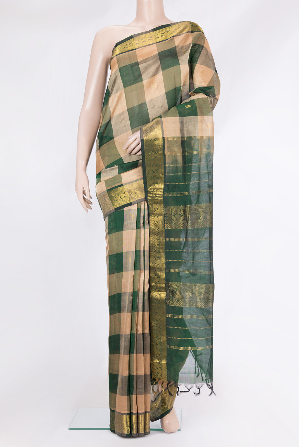 Multi Color Silk Cotton Saree with Checked design on the body and Zari Border.  displayed on a mannequin