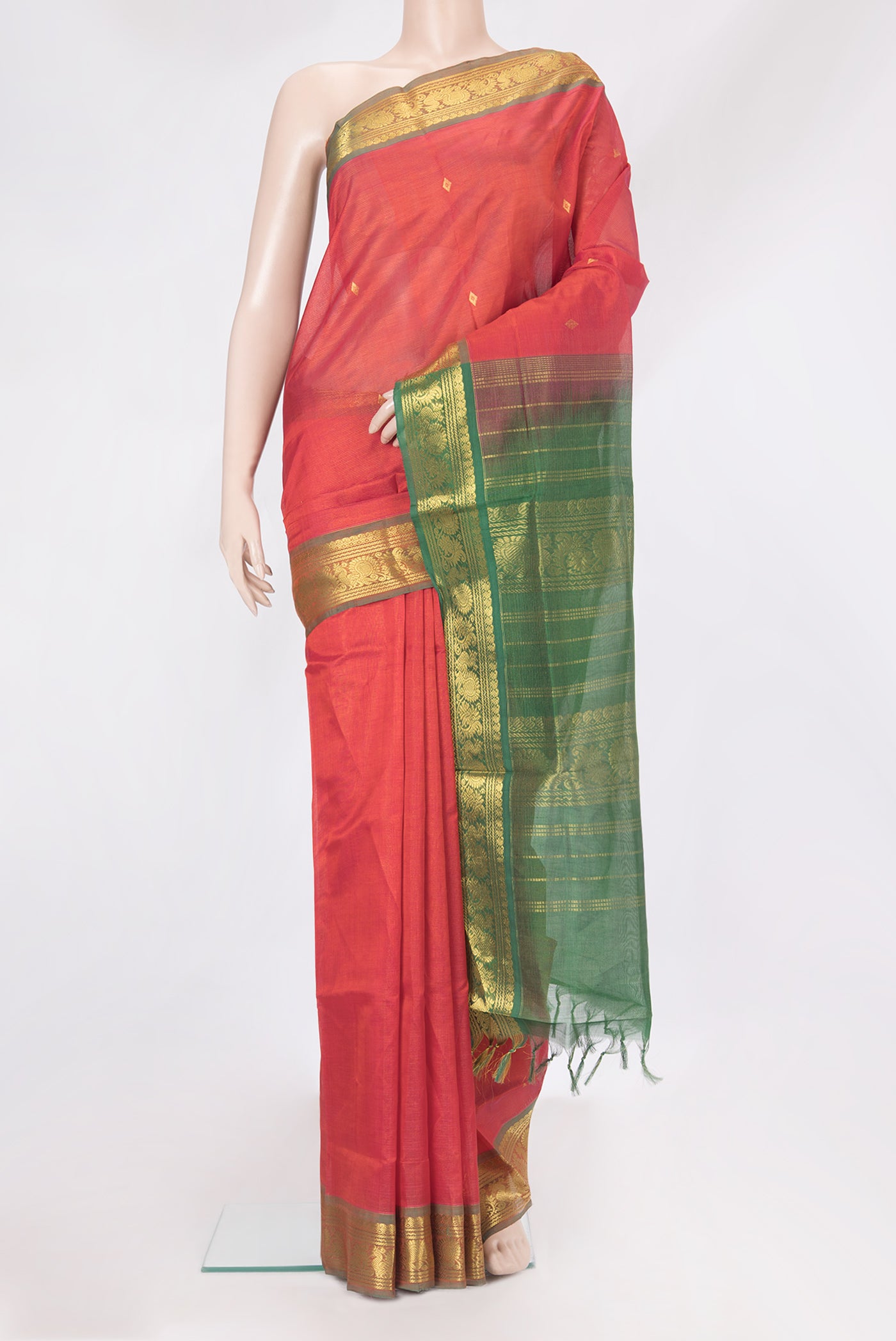 Red Silk Cotton Saree with Stripes on the body and Zari Border.  displayed on a mannequin
