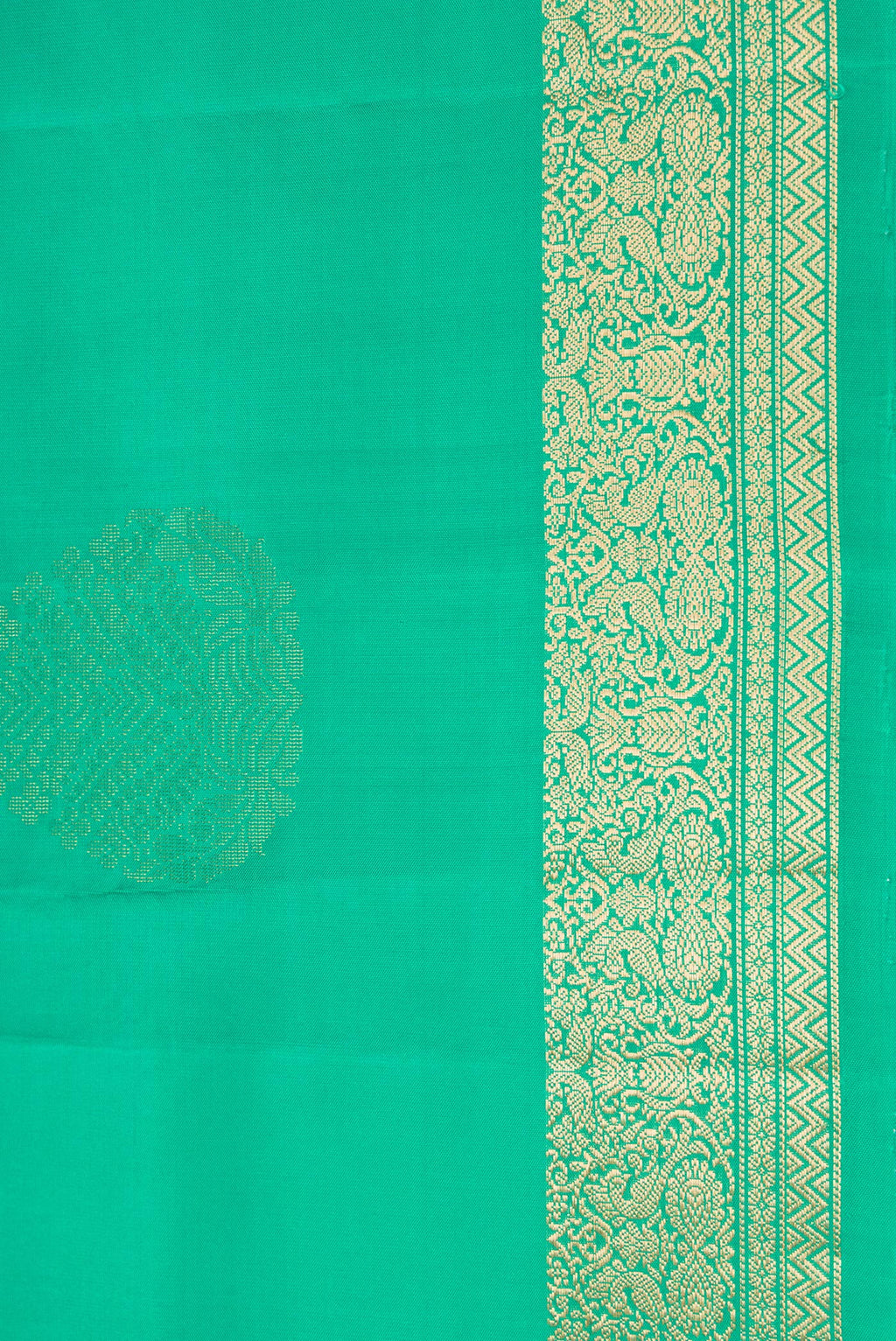 Border image of Green Dual Tone Soft Silk Saree with Zari Butta on the body and Zari Border. 