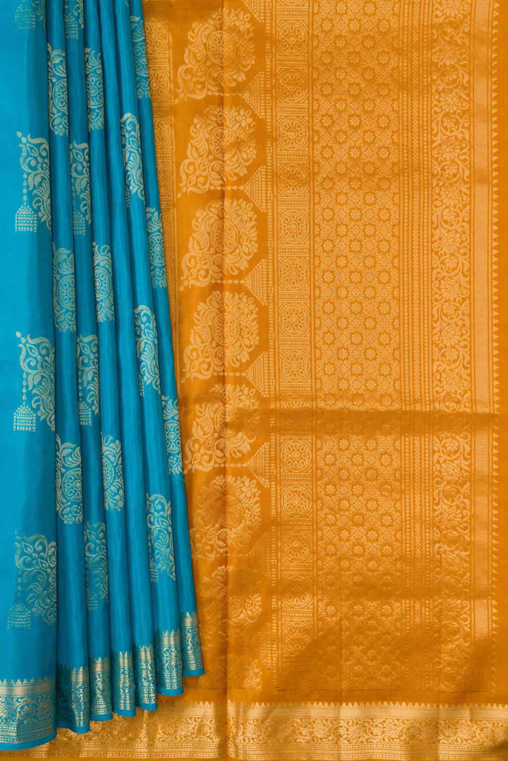 Pleats and pallu of Sky Blue Dual Tone Soft Silk Saree with Zari Butta on the body and Zari Border. 