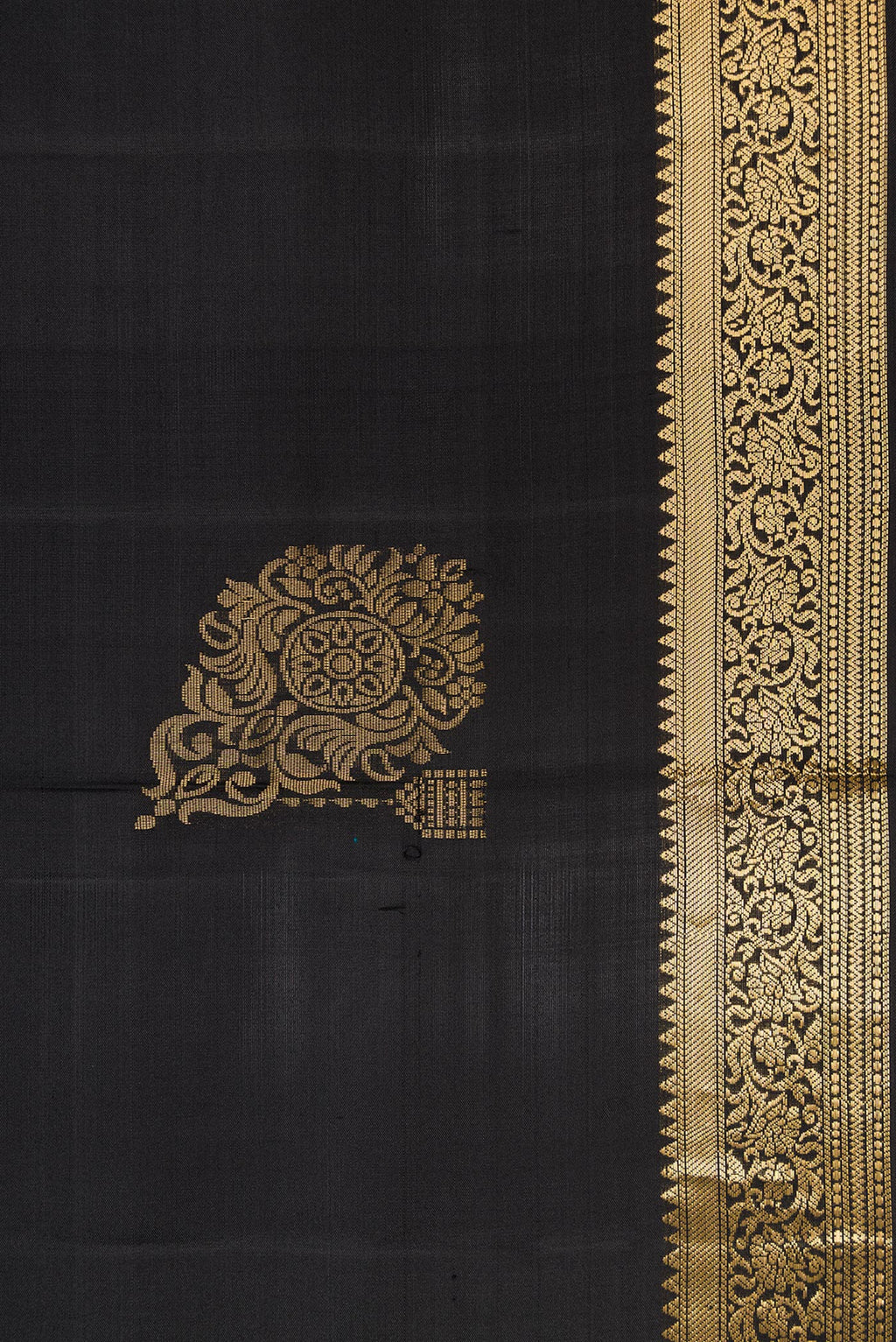 Border image of Black Dual Tone Soft Silk Saree with Zari Butta on the body and Zari Border. 