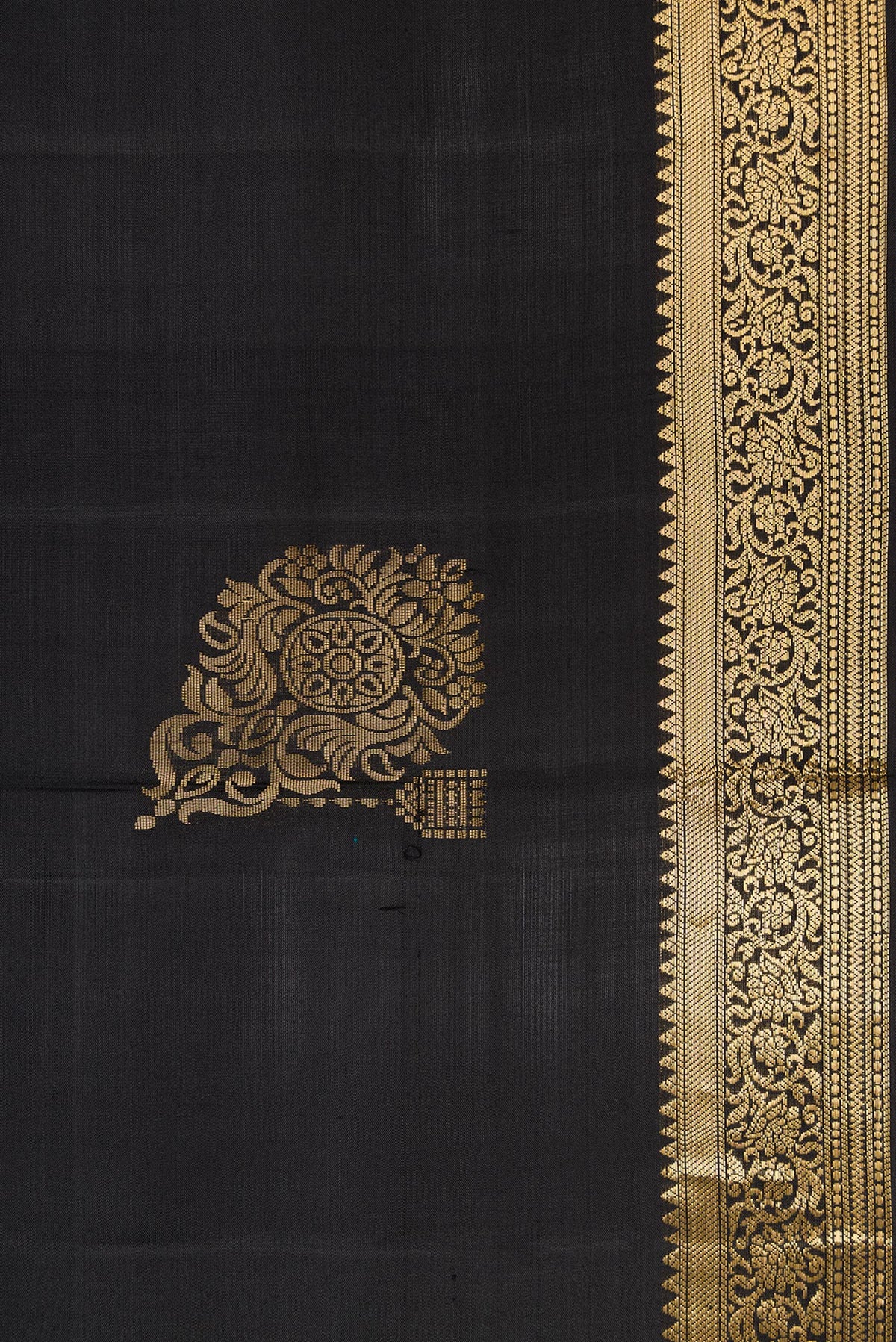 Border image of Black Dual Tone Soft Silk Saree with Zari Butta on the body and Zari Border. 