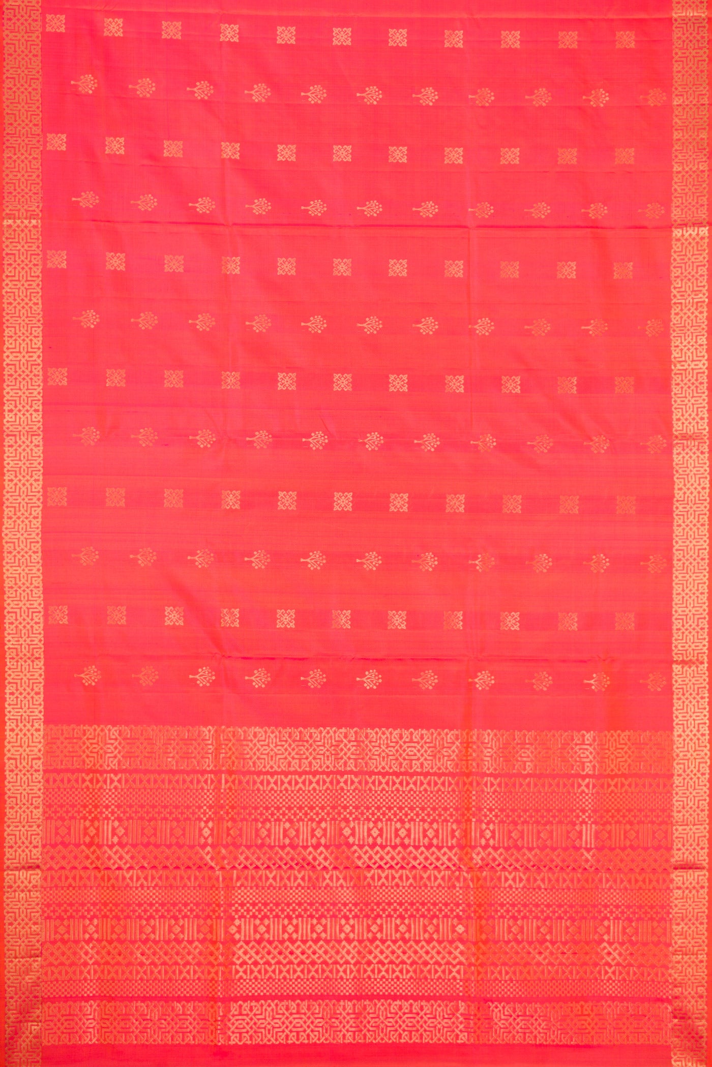 Flat view of Orange Dual Tone Soft Silk Saree with Zari Butta on the body and Zari Border. 