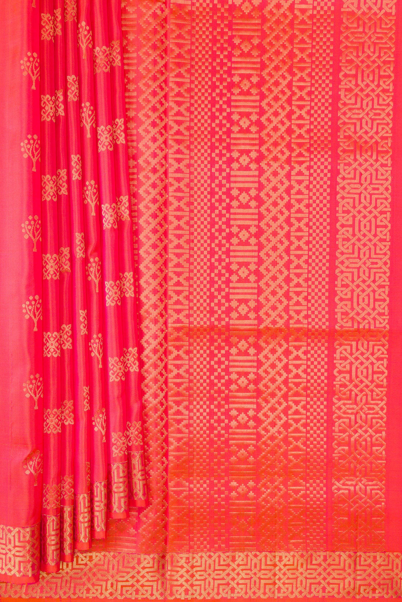 Pleats and pallu of Orange Dual Tone Soft Silk Saree with Zari Butta on the body and Zari Border. 