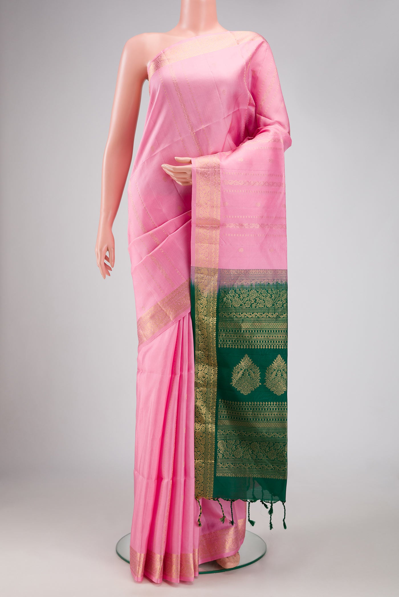 Pink Dual Tone Soft Silk Saree with Stripes on the body and Zari Border.  displayed on a mannequin