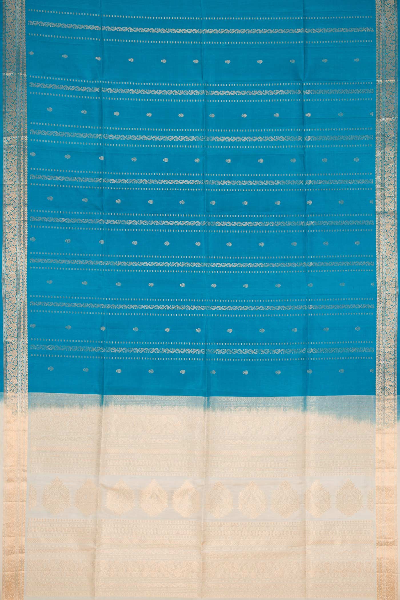 Flat view of Blue Dual Tone Soft Silk Saree with Zari Butta on the body and Zari Border
