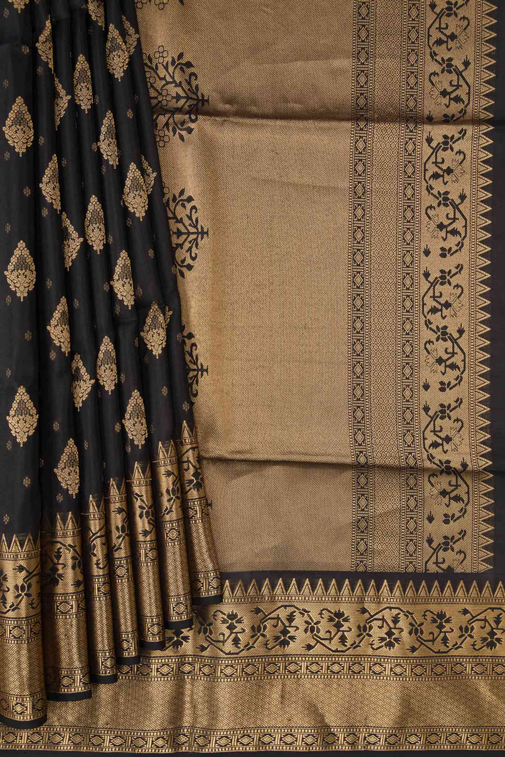 Pleats and pallu of Black Dual Tone Soft Silk Saree with Zari Butta on the body and Zari Border. 