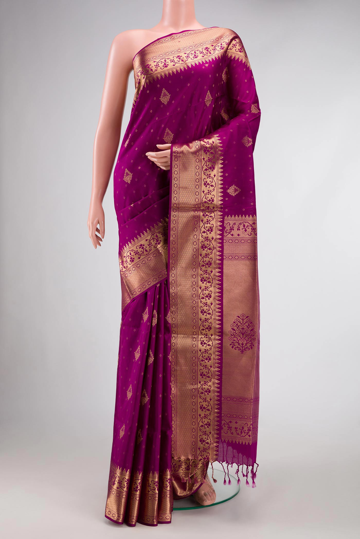 Magenta Dual Tone Soft Silk Saree with Zari Butta on the body and Zari Border.  displayed on a mannequin