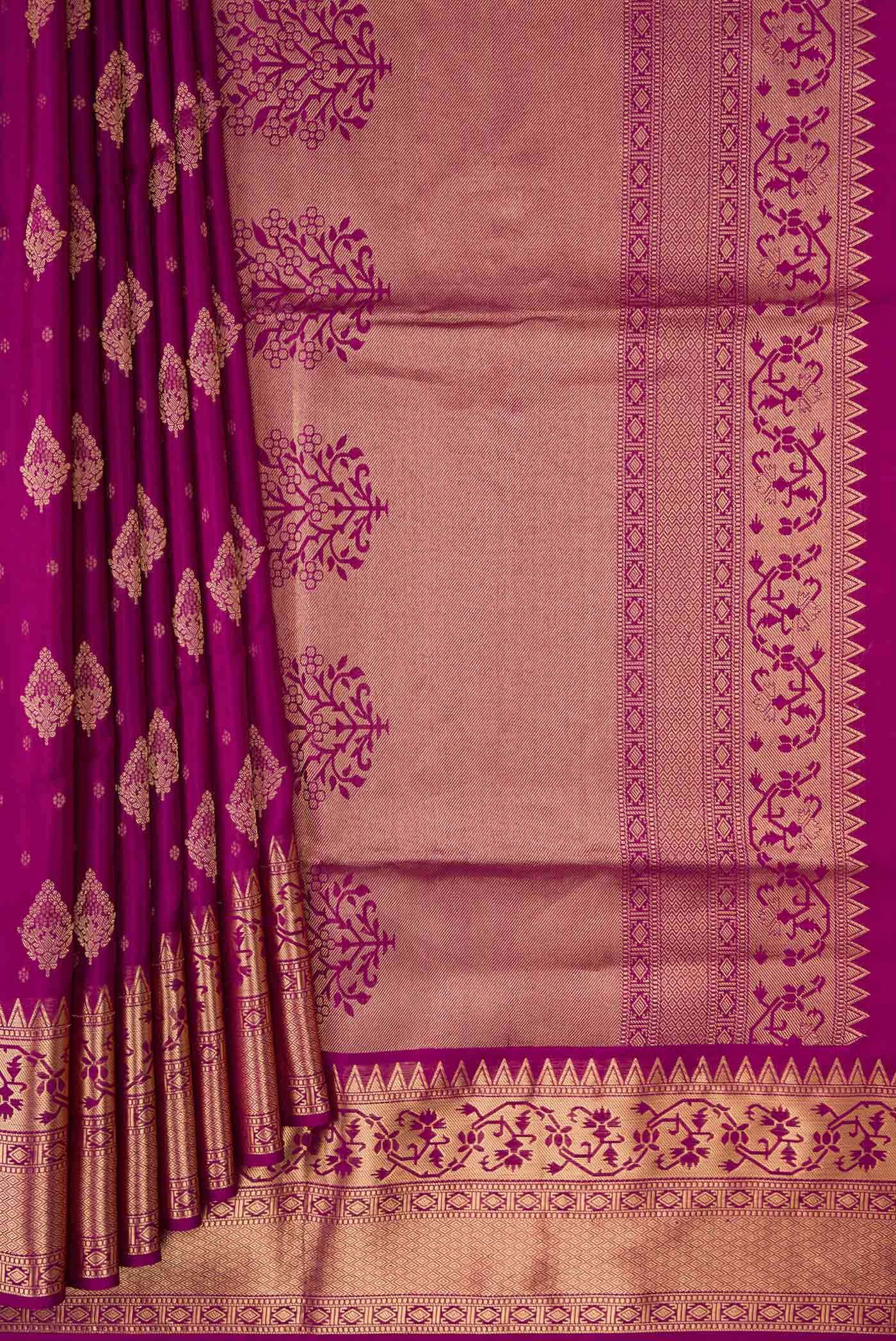 Pleats and pallu of Magenta Dual Tone Soft Silk Saree with Zari Butta on the body and Zari Border. 
