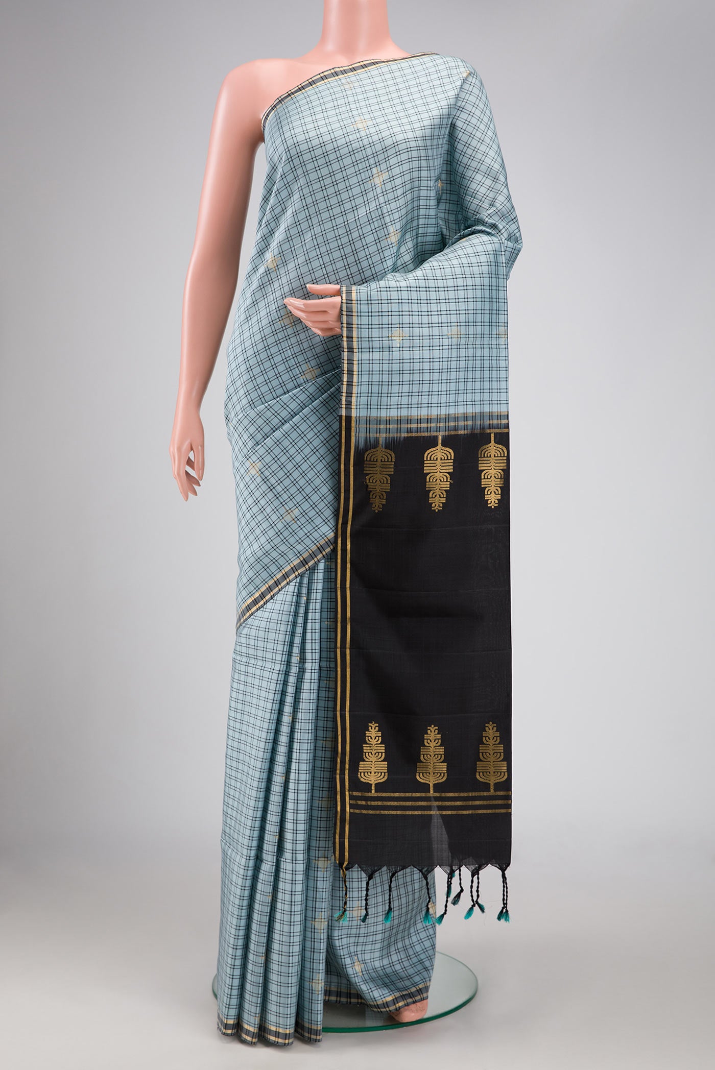Grey Dual Tone Soft Silk Saree with Checked design on the body and Zari Border.  displayed on a mannequin