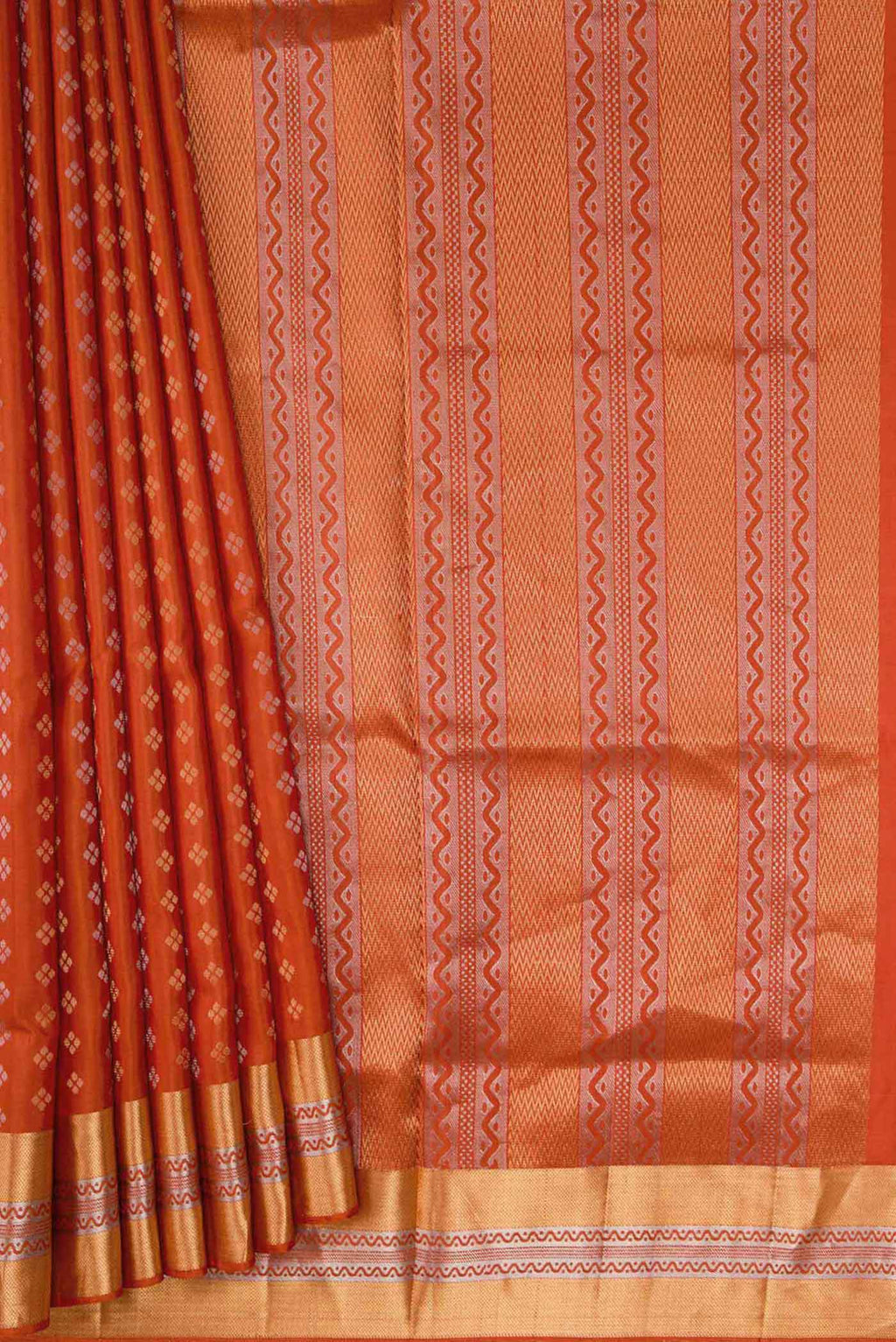 Pleats and pallu of Orange Dual Tone Soft Silk Saree with Zari Butta on the body and Zari Border