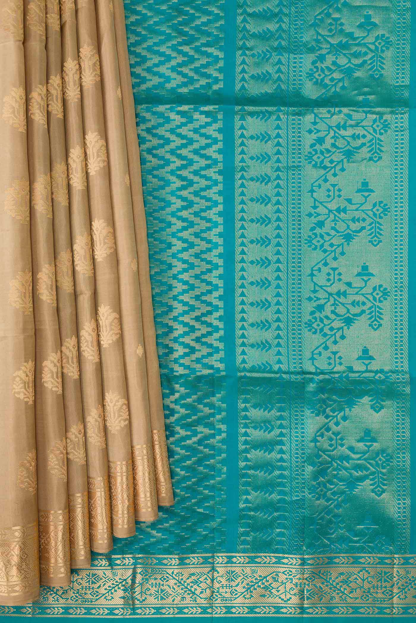 Pleats and pallu of Dark Beige Dual Tone Soft Silk Saree with Zari Butta on the body and Zari Border. 