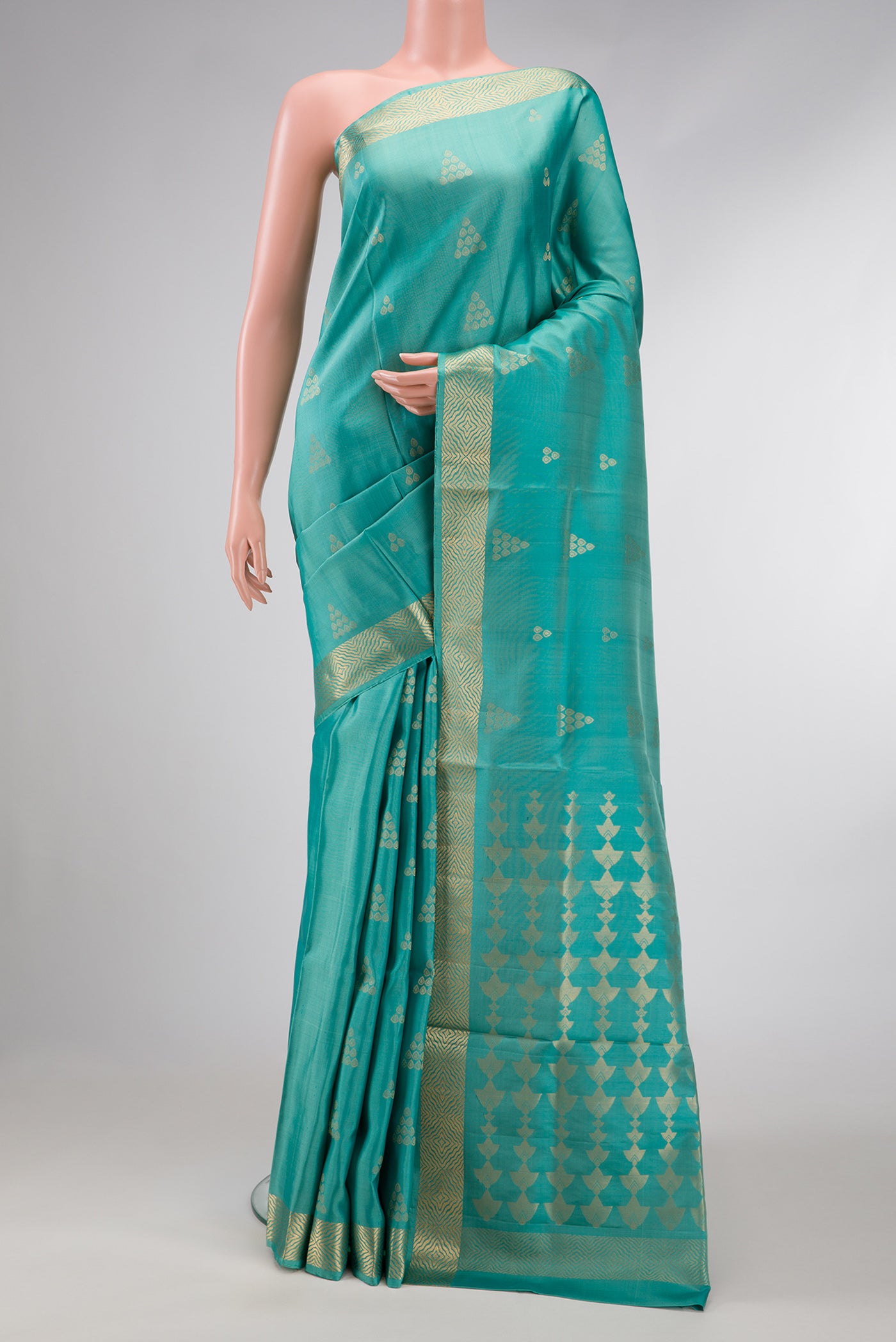 Sky Blue Dual Tone Soft Silk Saree with Zari Butta on the body and Zari Border.  displayed on a mannequin