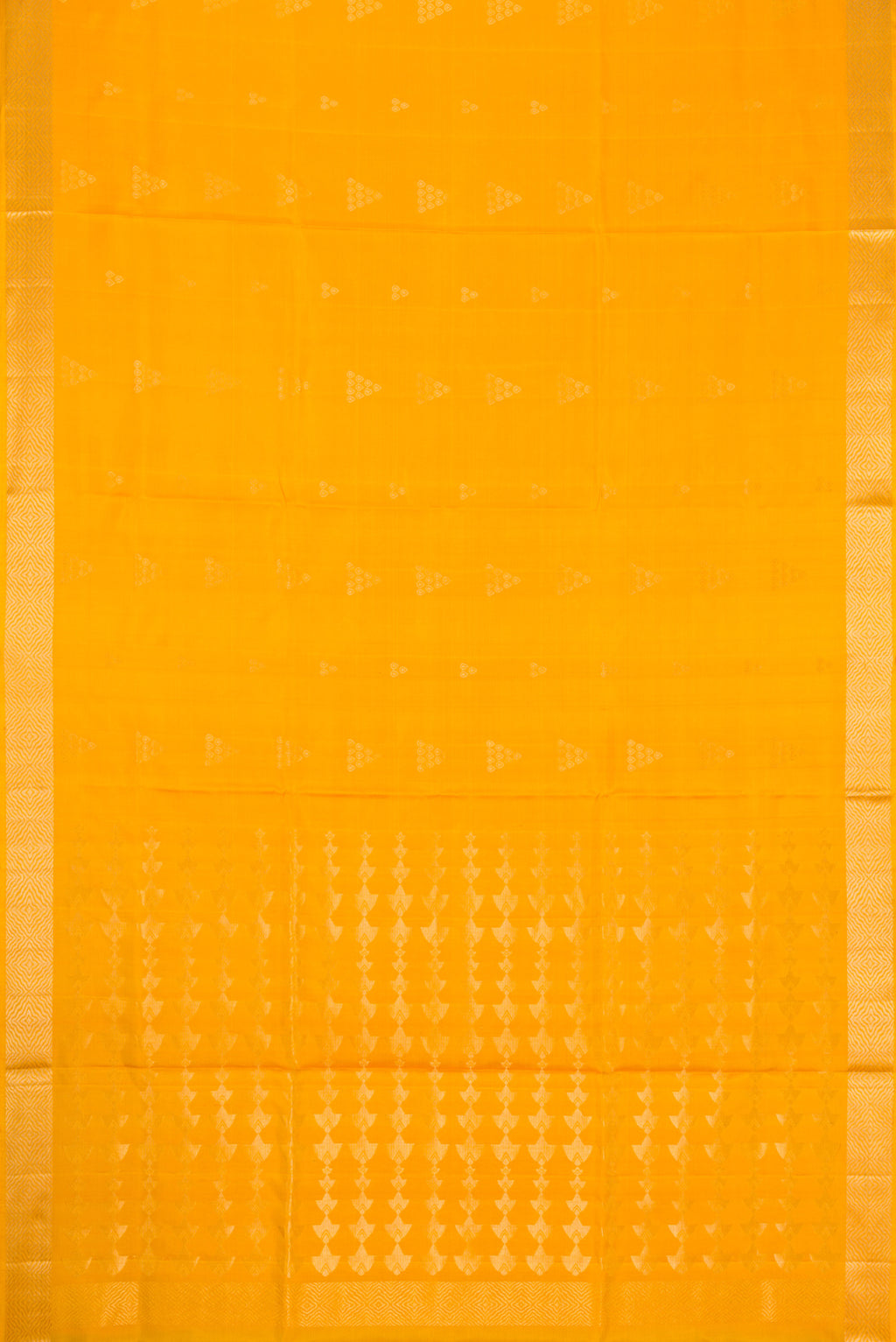 Flat view of Yellow Dual Tone Soft Silk Saree with Zari Butta on the body and Zari Border. 