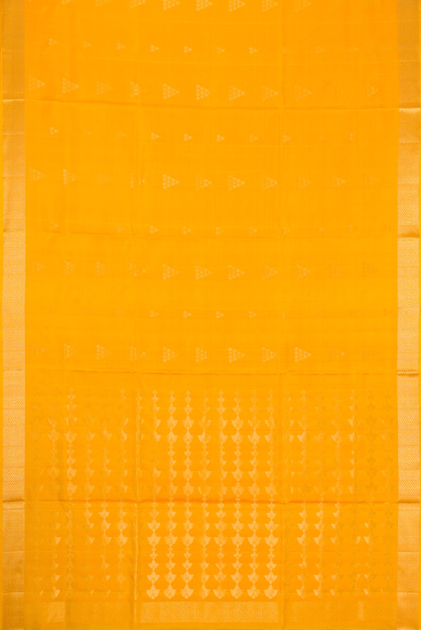 Flat view of Yellow Dual Tone Soft Silk Saree with Zari Butta on the body and Zari Border. 