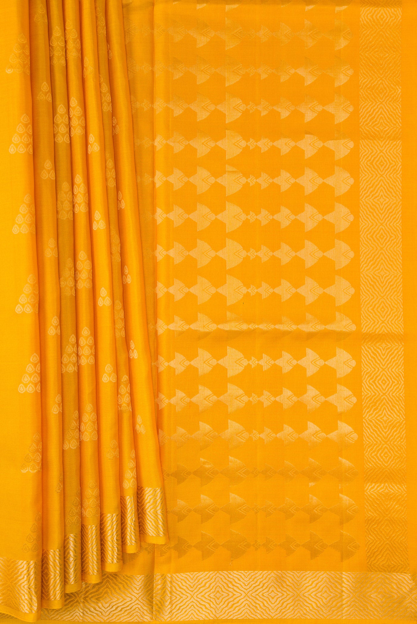Pleats and pallu of Yellow Dual Tone Soft Silk Saree with Zari Butta on the body and Zari Border. 