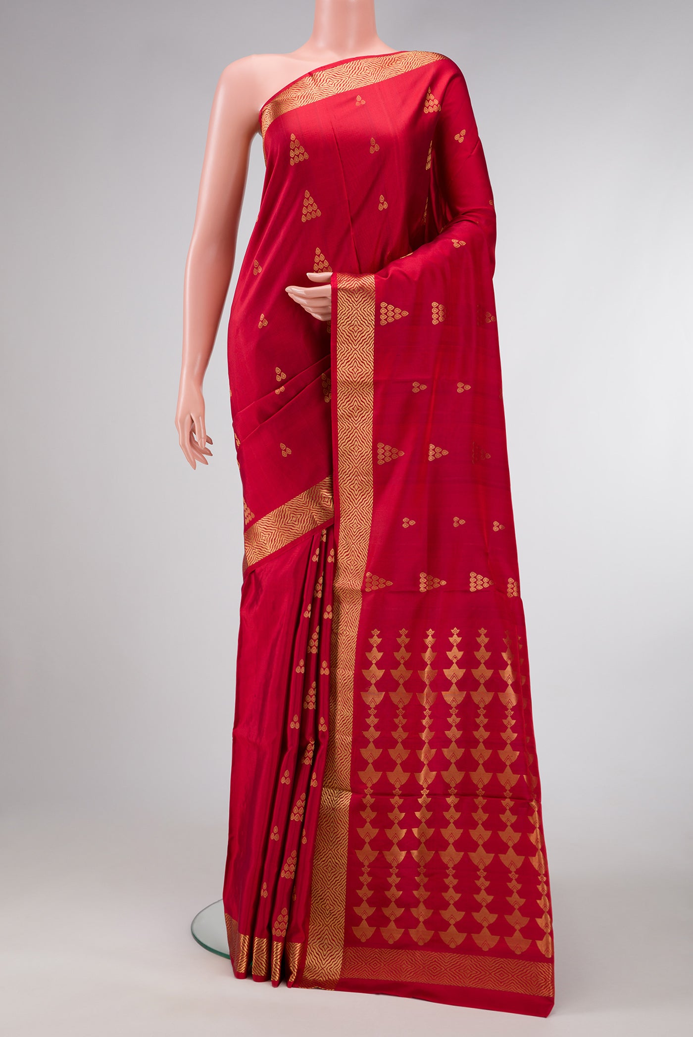 Maroon Dual Tone Soft Silk Saree with Zari Butta on the body and Zari Border.  displayed on a mannequin
