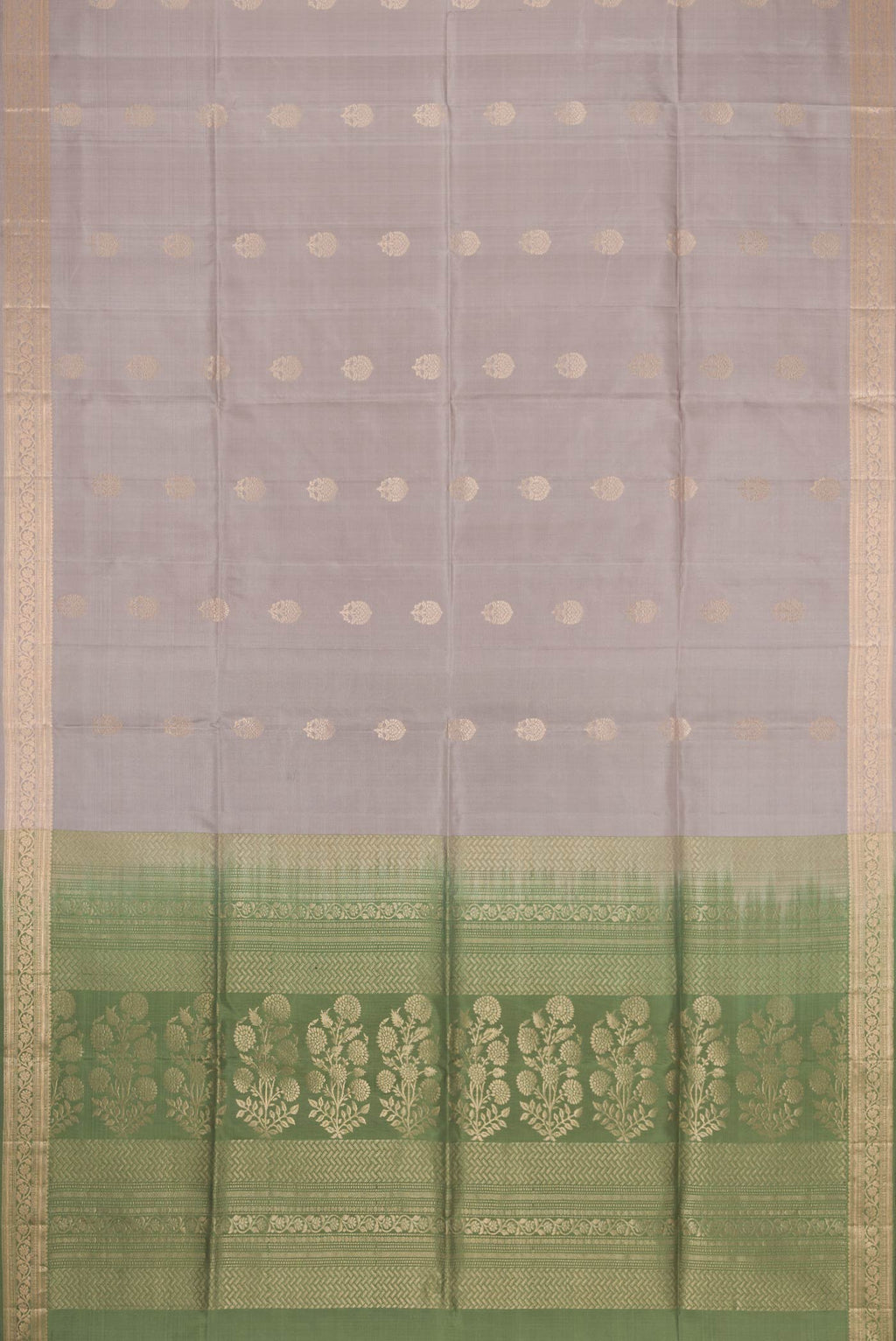 Flat view of Grey Dual Tone Soft Silk Saree with Zari Butta on the body and Zari Border. 