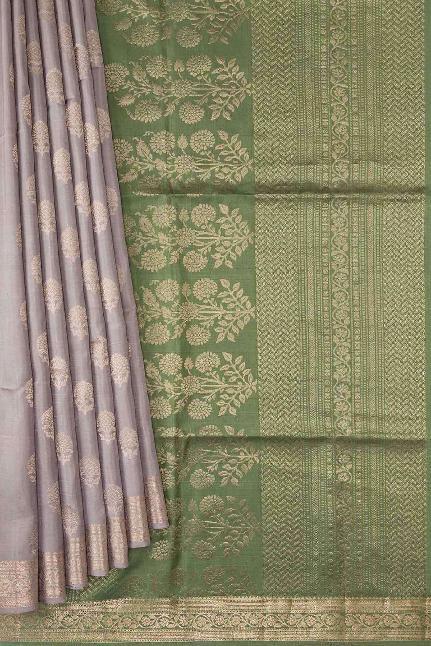 Pleats and pallu of Grey Dual Tone Soft Silk Saree with Zari Butta on the body and Zari Border. 