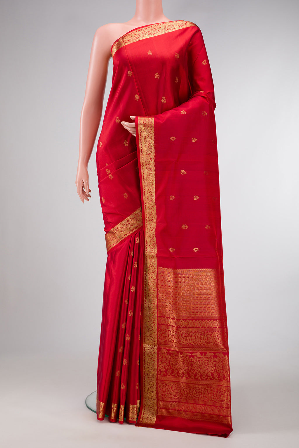 Maroon Dual Tone Soft Silk Saree with Zari Butta on the body and Zari Border.  displayed on a mannequin