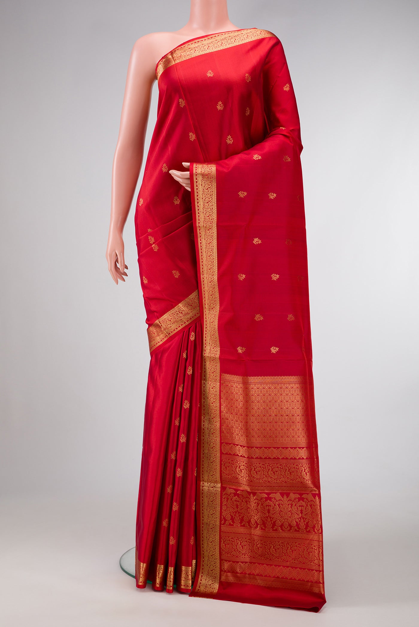 Maroon Dual Tone Soft Silk Saree with Zari Butta on the body and Zari Border.  displayed on a mannequin