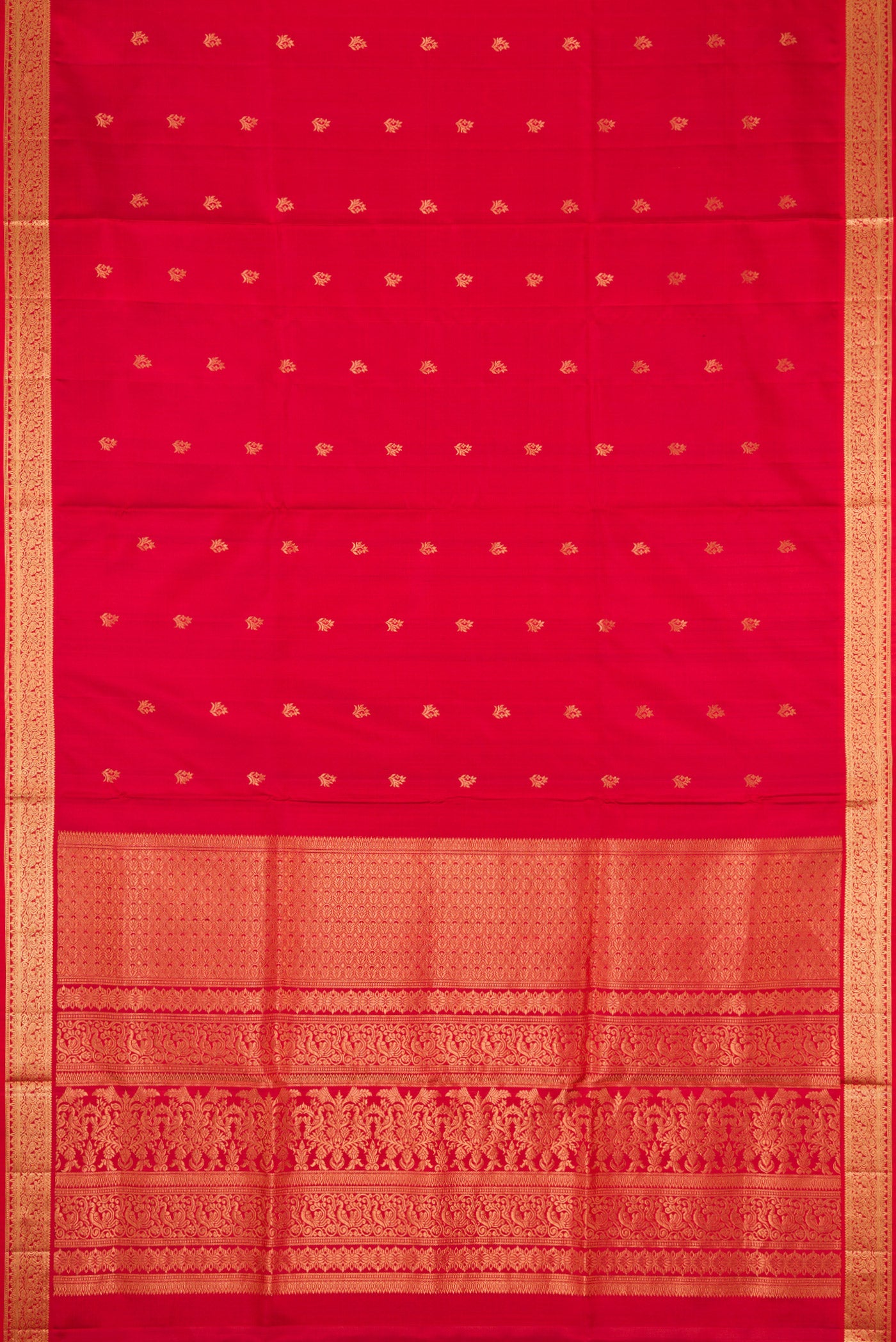 Flat view of Maroon Dual Tone Soft Silk Saree with Zari Butta on the body and Zari Border. 