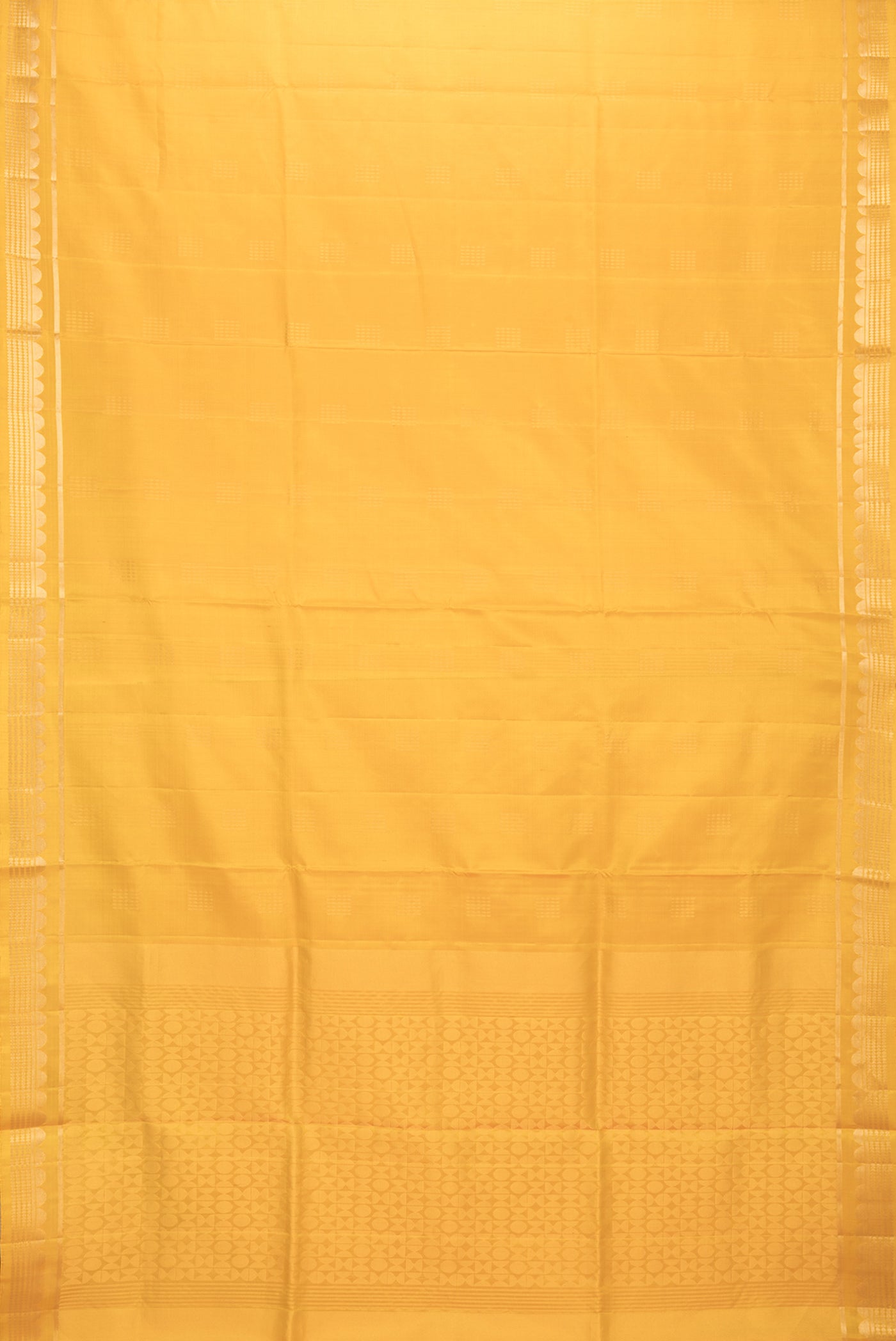 Flat view of Yellow Dual Tone Soft Silk Saree with Zari Butta on the body and Zari Border. 