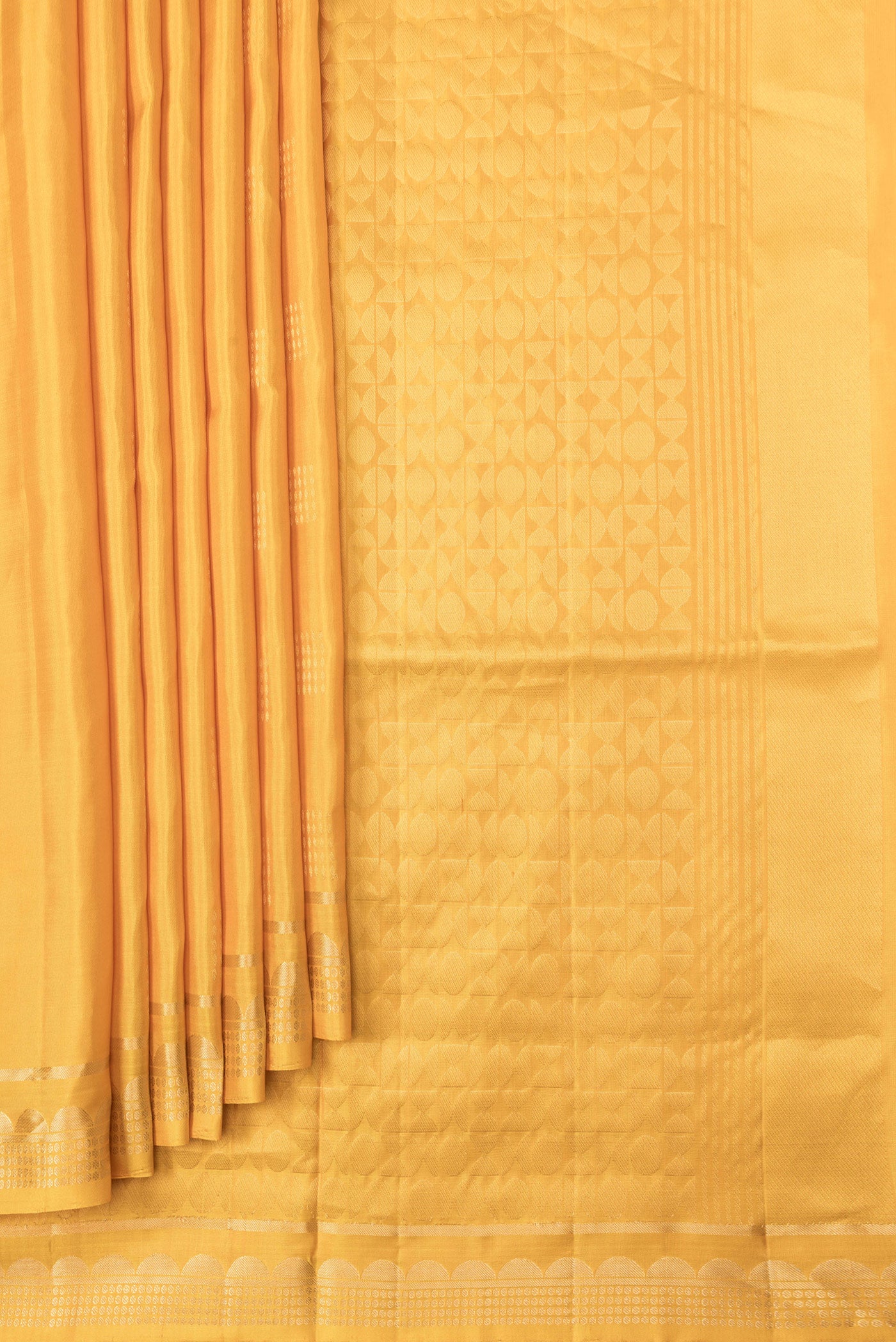 Pleats and pallu of Yellow Dual Tone Soft Silk Saree with Zari Butta on the body and Zari Border. 