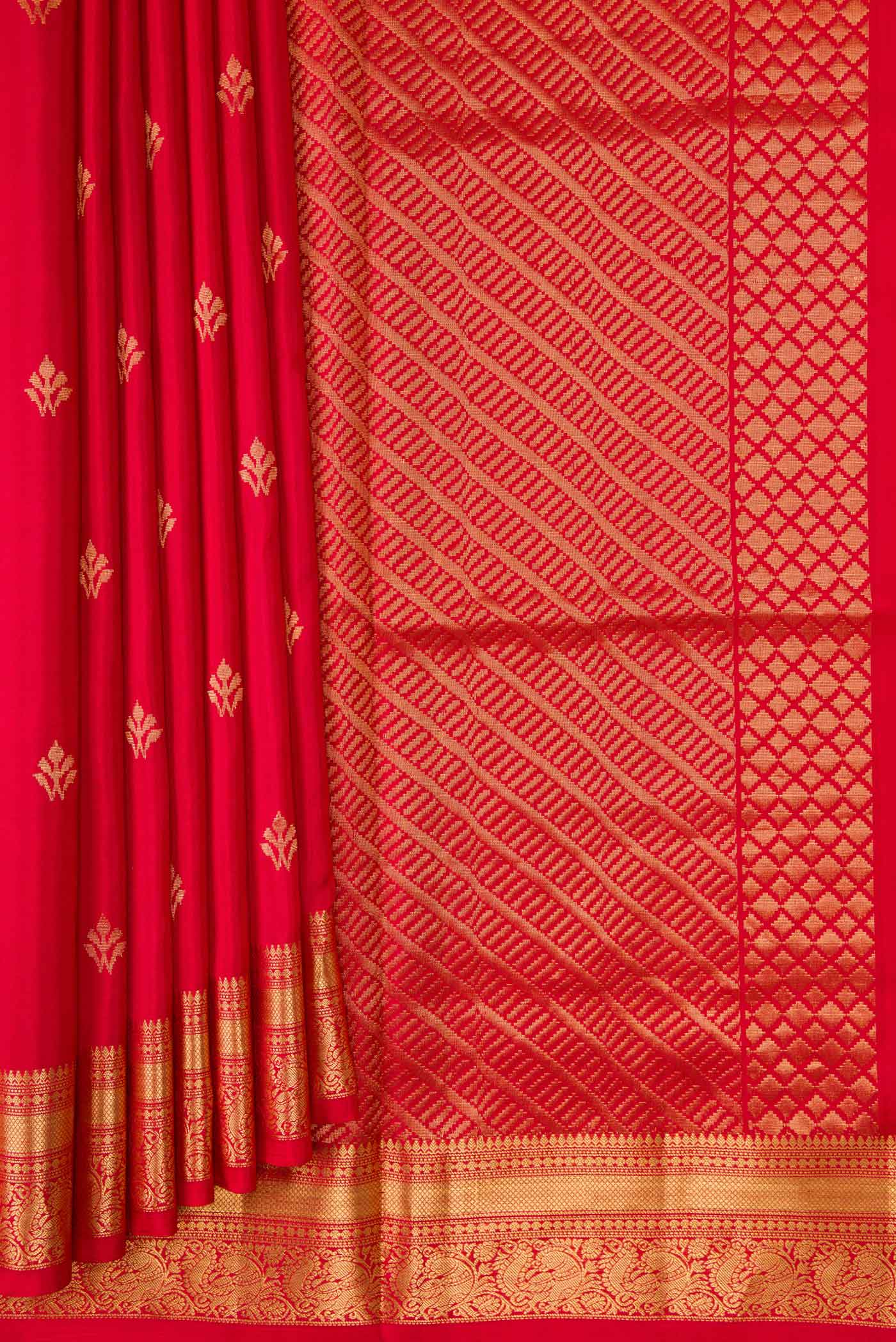 Pleats and pallu of Red Dual Tone Soft Silk Saree with Zari Butta on the body and Zari Border. 