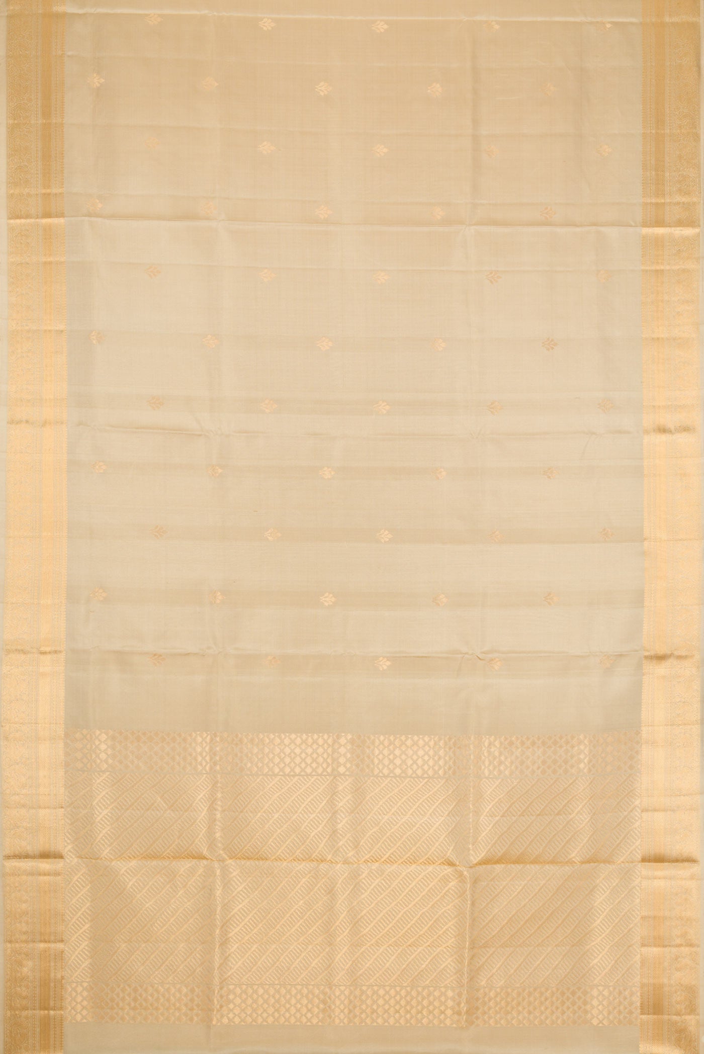 Flat view of Beige Dual Tone Soft Silk Saree with Zari Butta on the body and Zari Border