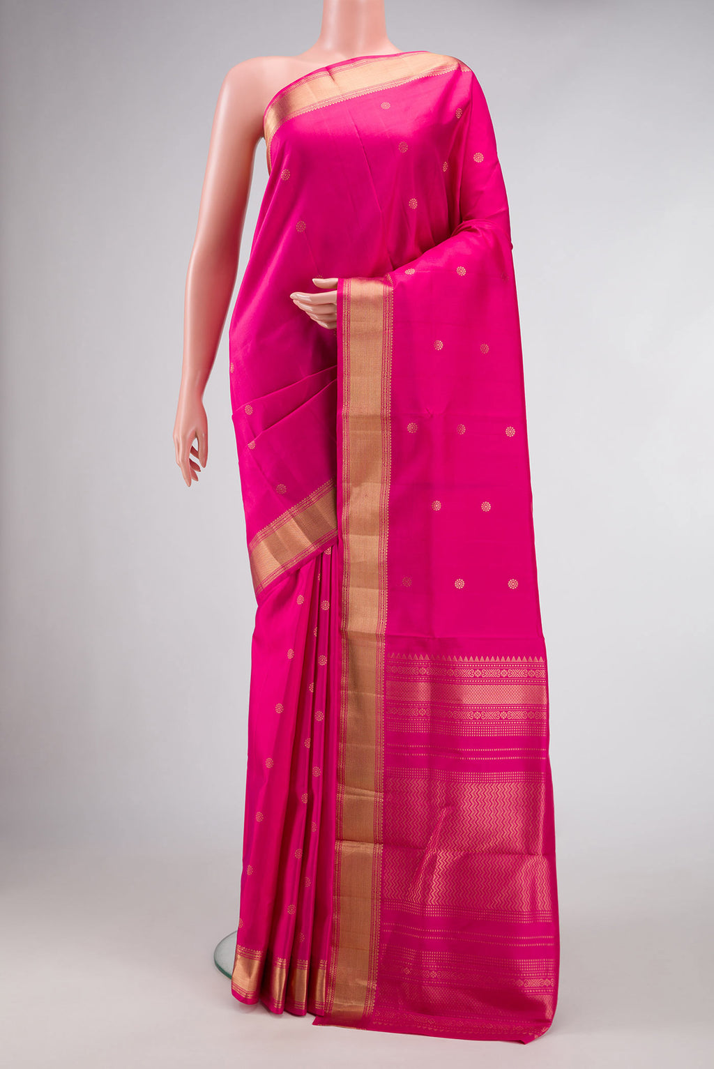 Pink Dual Tone Soft Silk Saree with Zari Butta on the body and Zari Border.  displayed on a mannequin