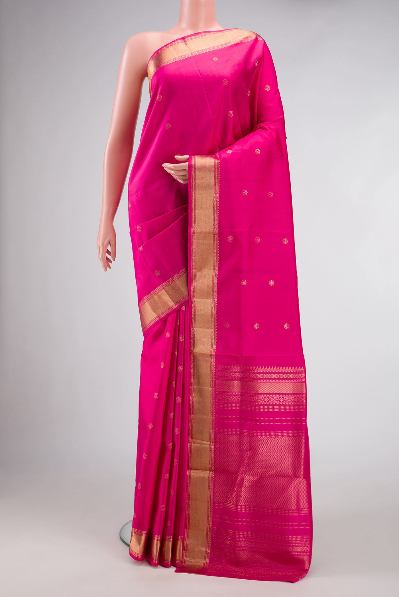 Pink Dual Tone Soft Silk Saree with Zari Butta on the body and Zari Border.  displayed on a mannequin