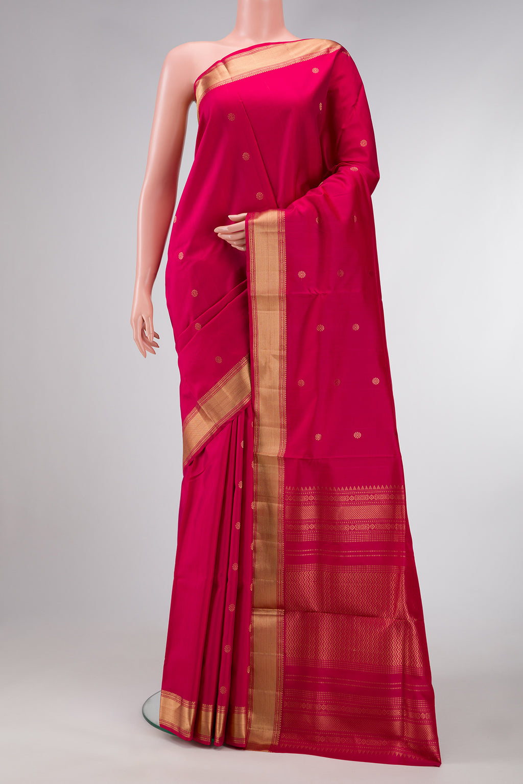 Pink Dual Tone Soft Silk Saree with Zari Butta on the body and Zari Border.  displayed on a mannequin