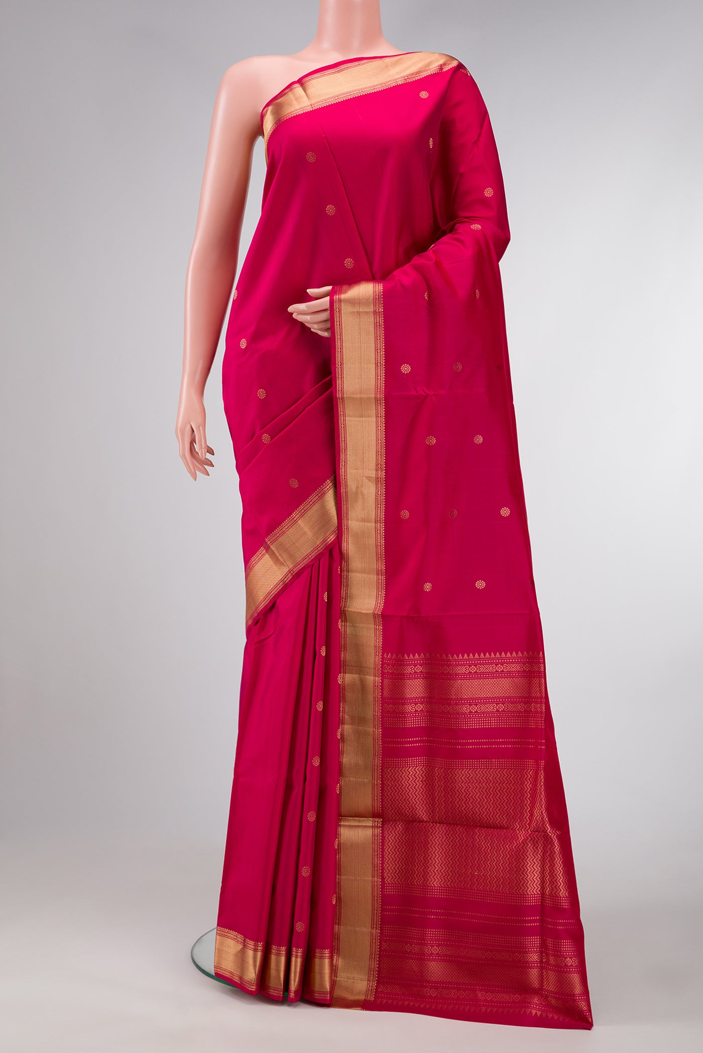 Pink Dual Tone Soft Silk Saree with Zari Butta on the body and Zari Border.  displayed on a mannequin