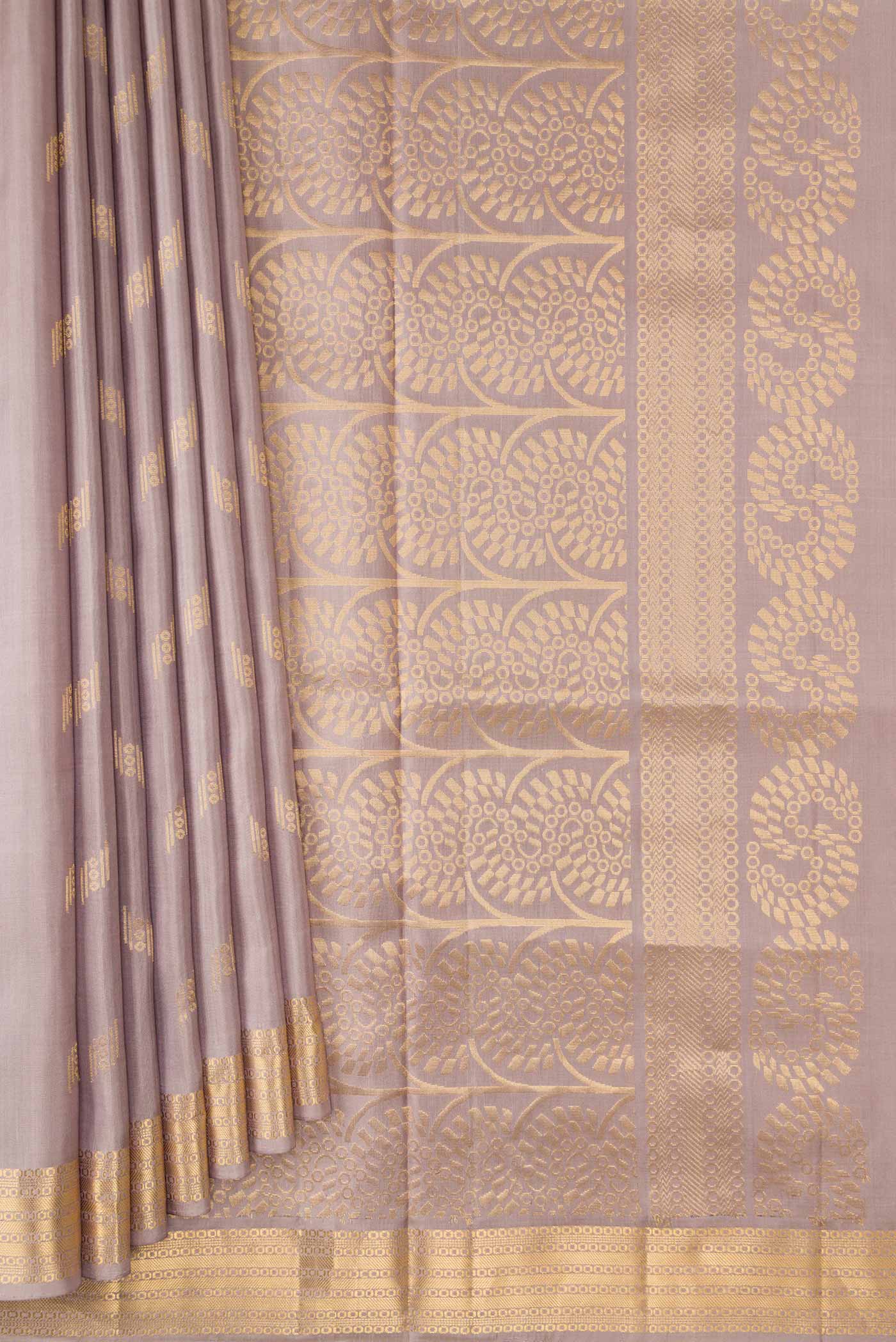 Pleats and pallu of Grey Dual Tone Soft Silk Saree with Zari Butta on the body and Zari Border. 