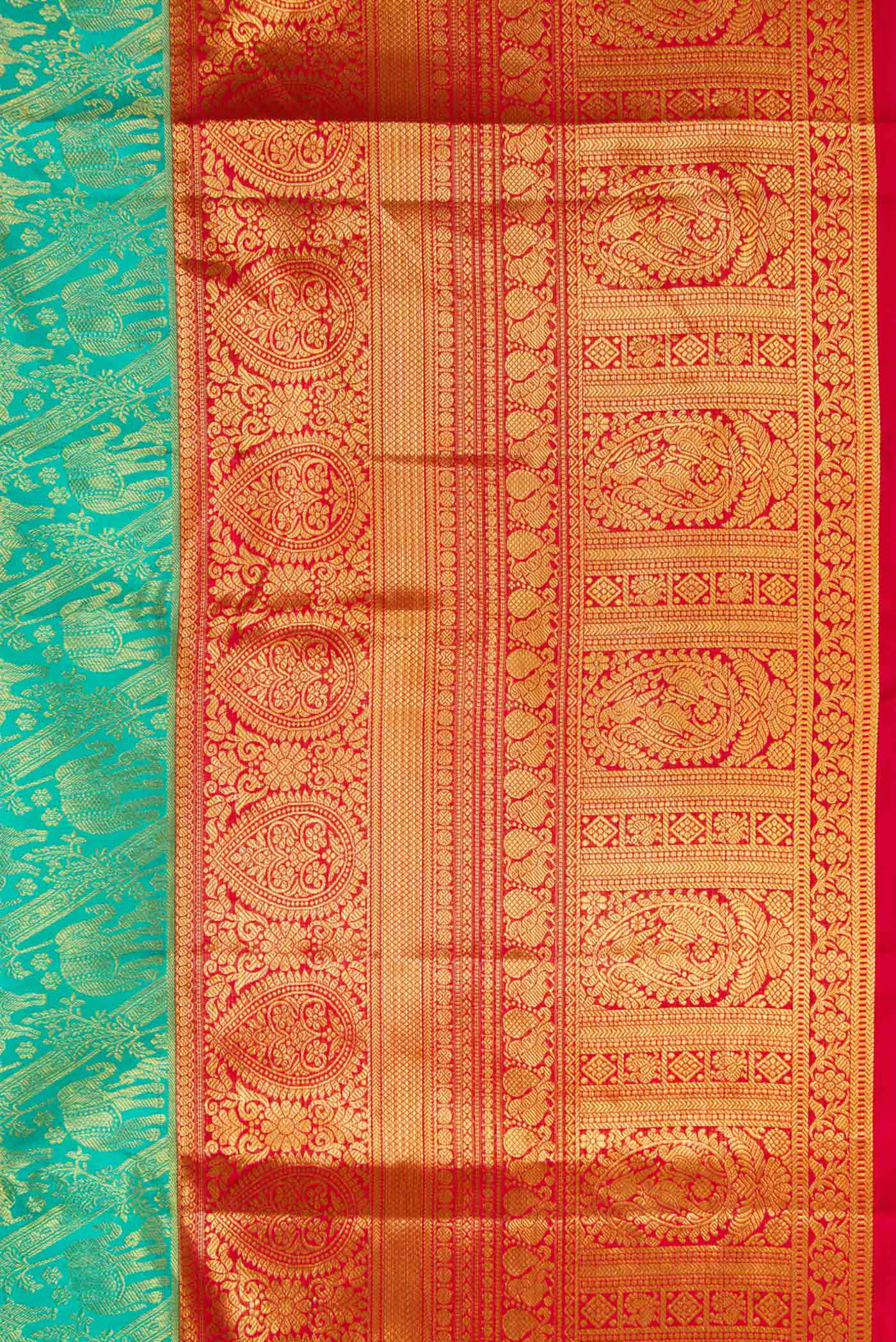 Border image of Sea Green Dual Tone Kanchipuram Silk Saree with Zari Brocade on the body and Zari Border. 