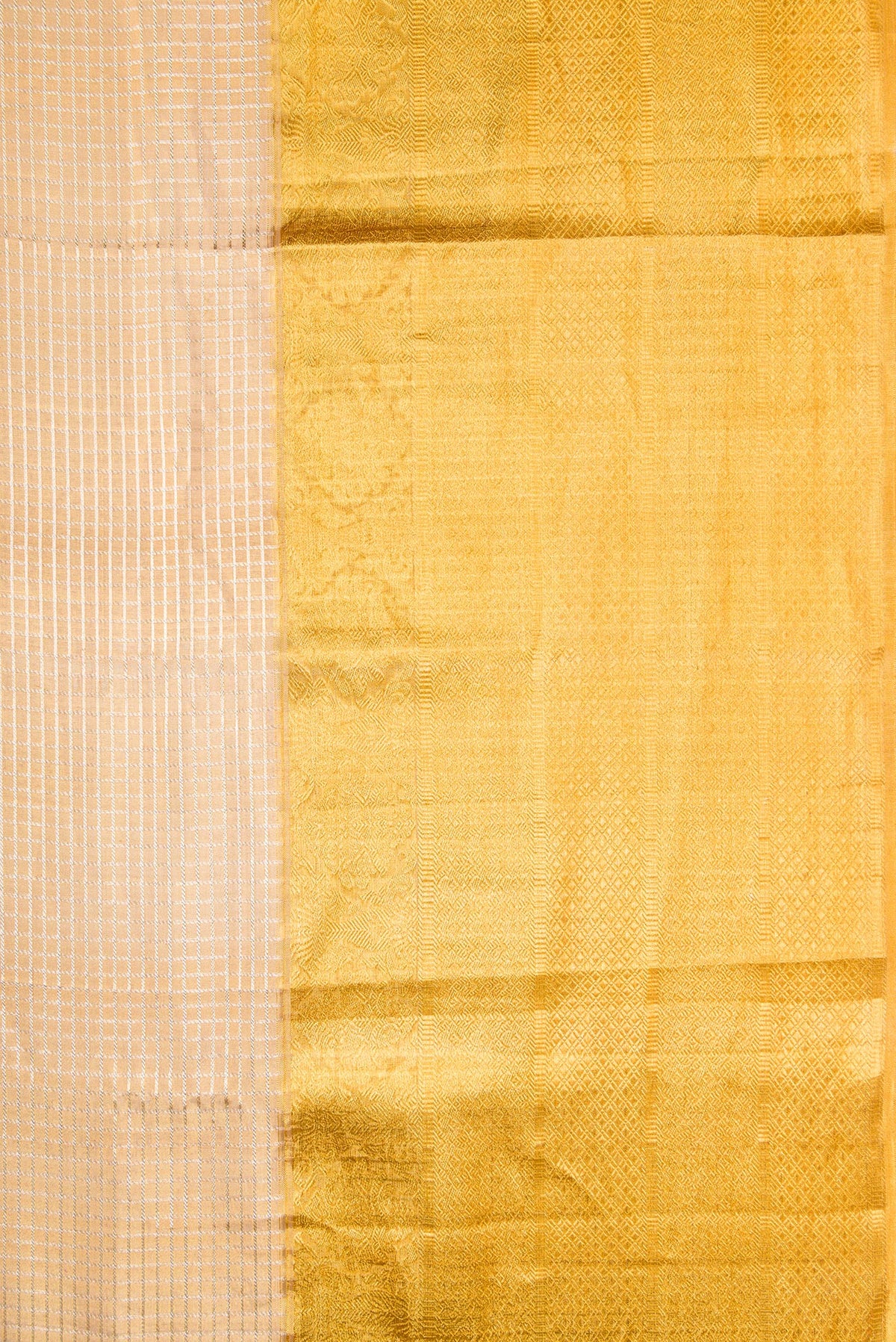 Border image of Gold Dual Tone Kanjivaram Tissue Silk Saree with Zari Brocade on the body and Zari Border. 