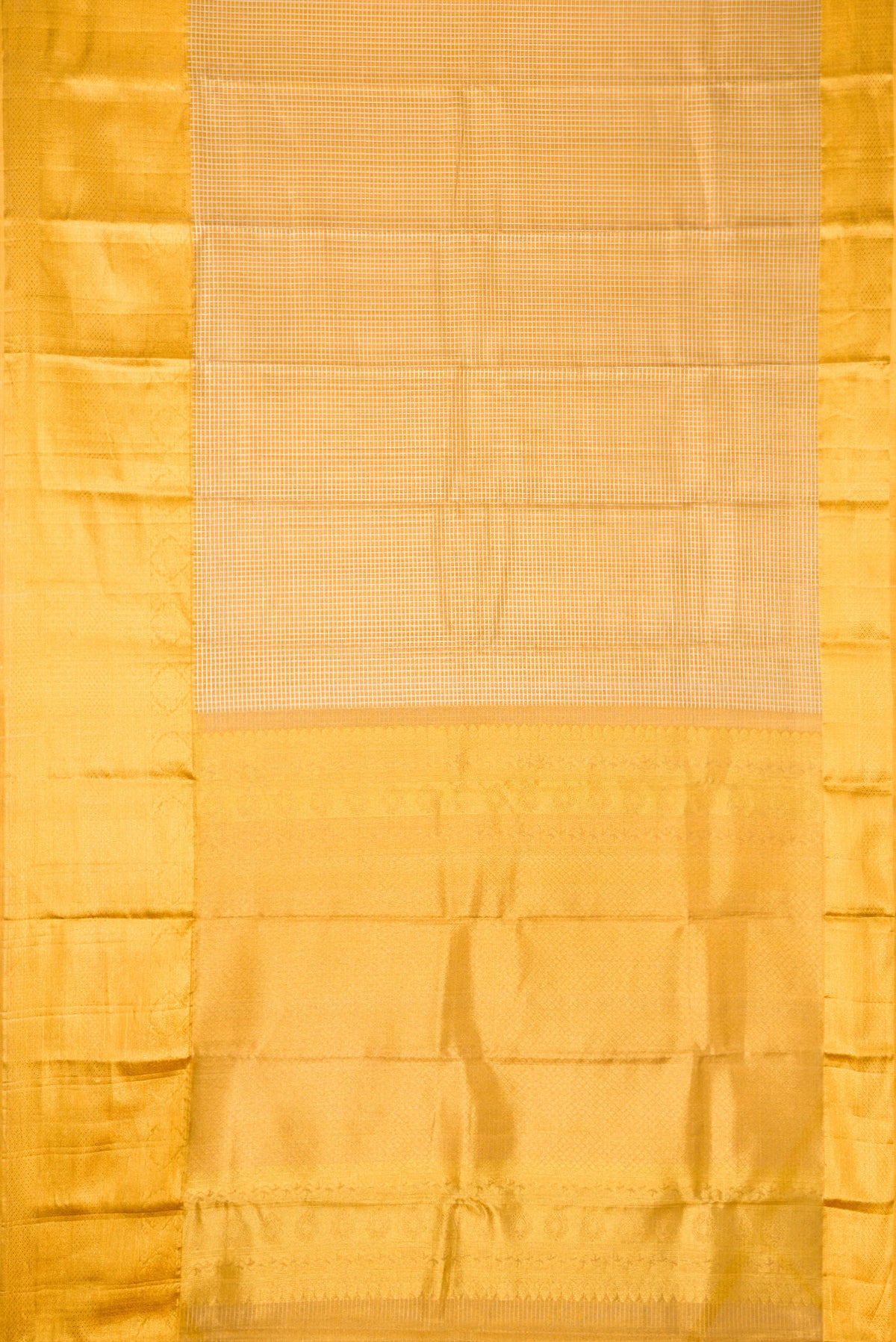 Flat view of Gold Dual Tone Kanjivaram Tissue Silk Saree with Zari Brocade on the body and Zari Border. 