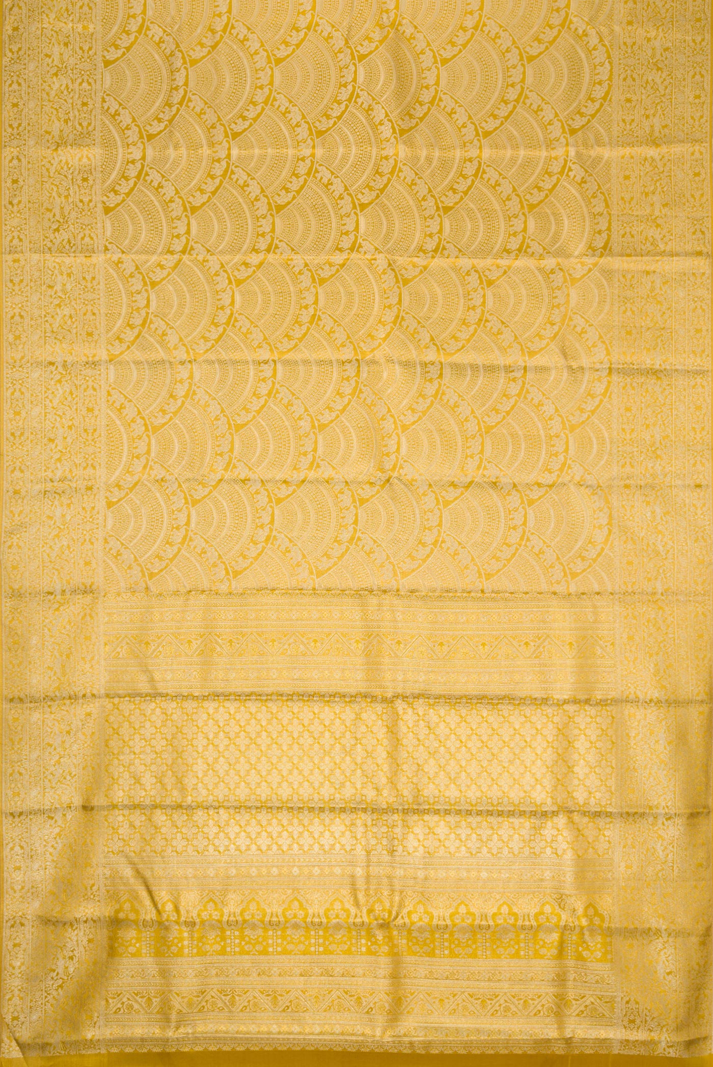 Flat view of Gold Dual Tone Kanchipuram Tissue Silk Saree with Zari Brocade on the body and Zari Border. 