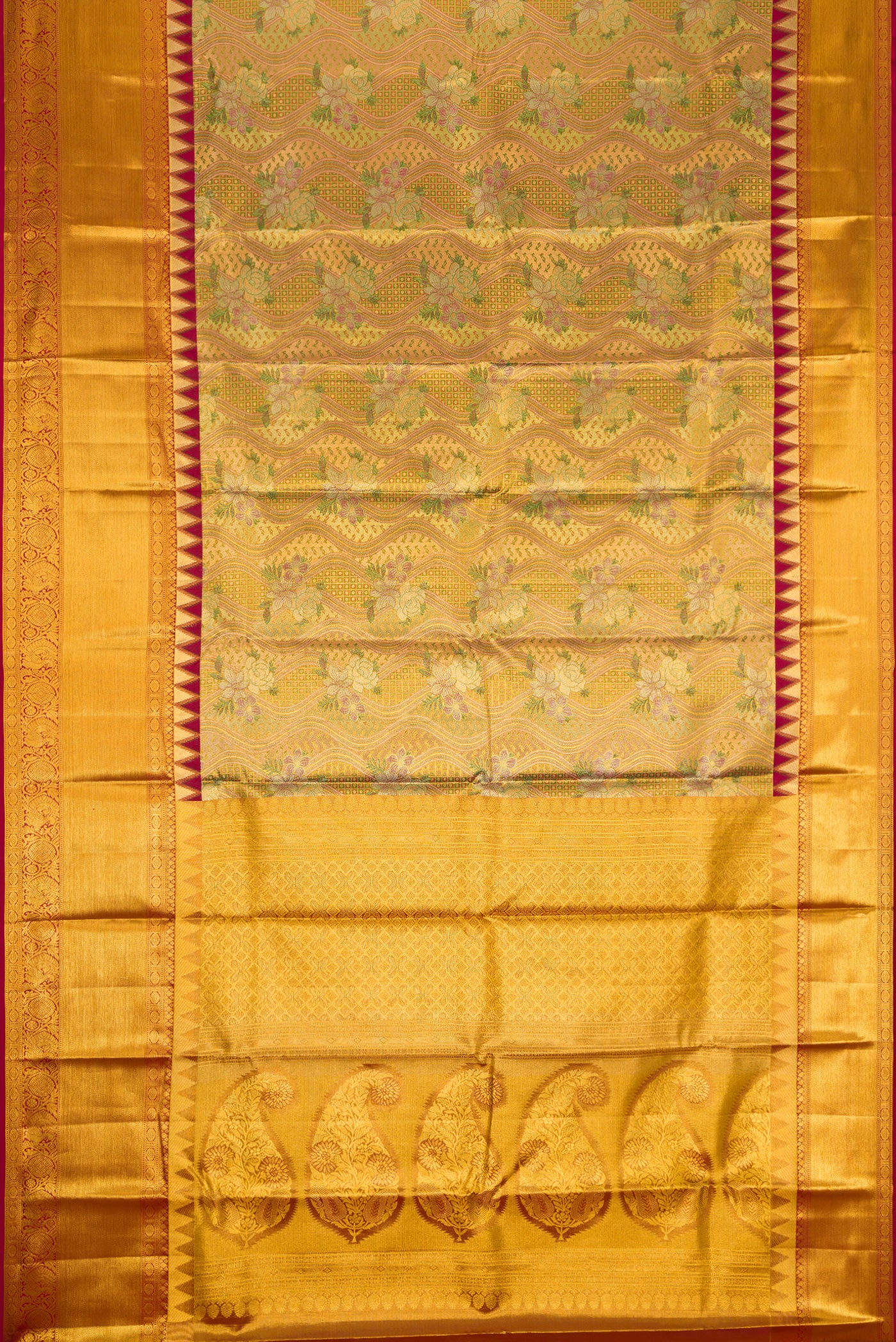Flat view of Gold Dual Tone Kanjivaram Tissue Silk Saree with Zari Brocade on the body and Zari Border. 